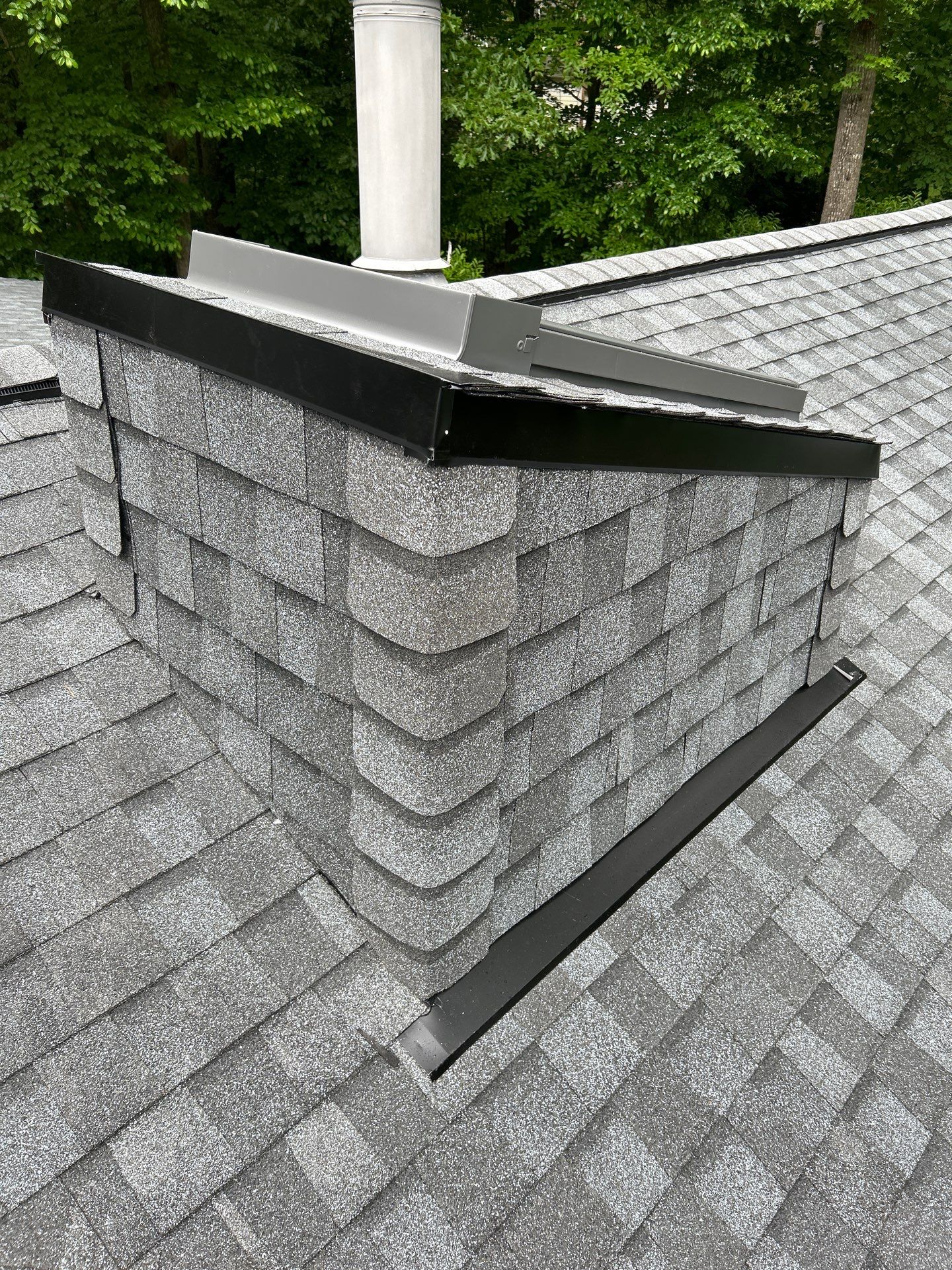 Oakton: Roof Replacement With CertainTeed Landmark Designer Shingles in Pewter by RM Banning, Inc.