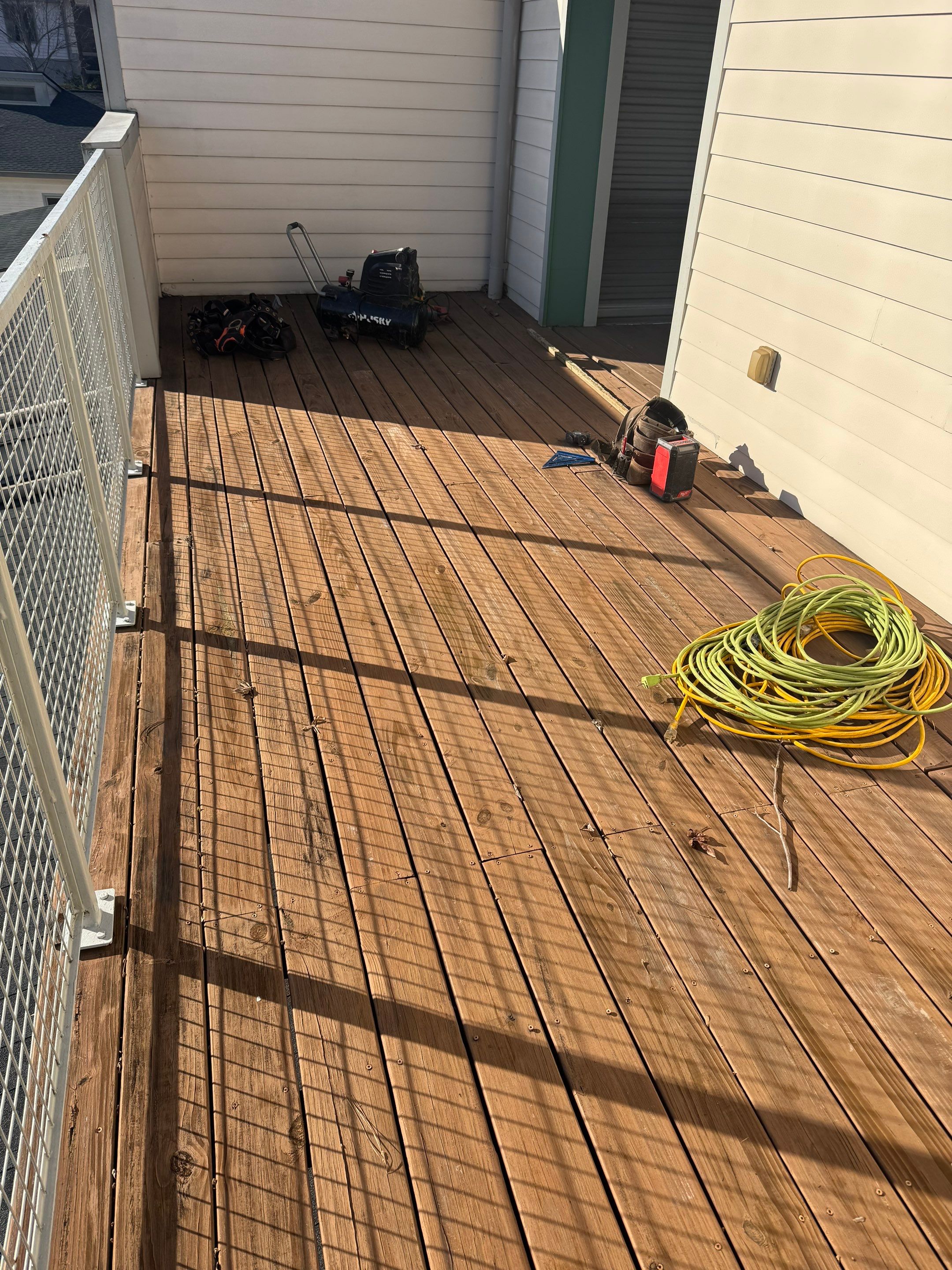 Atlanta Elevated Pressure-Treated Deck Installation With Mesh Railings by Swift Home Renovations 