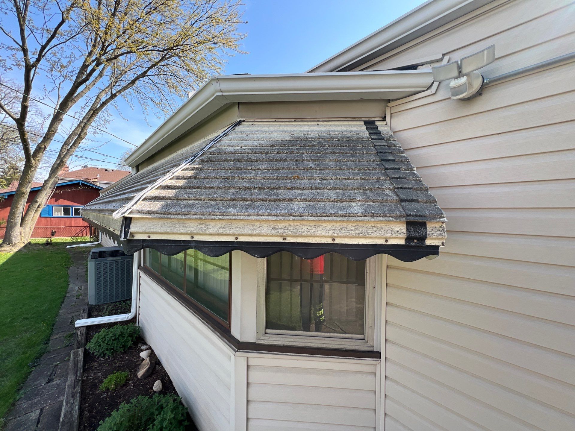 Housewashing  using Algaecide, soft wash soap by Northern Power Washing LLC.