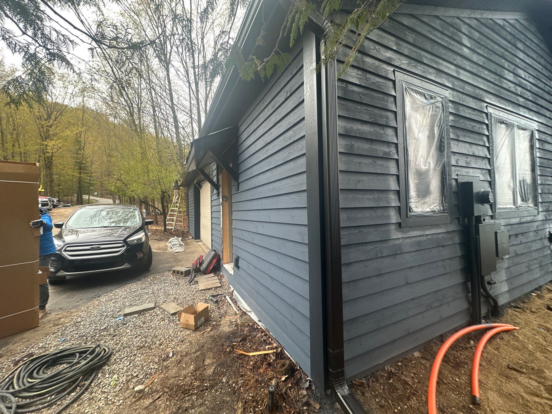 Gutter and Gutter Helmet Installation for Kewadin Residence by Rainbow Seamless Systems