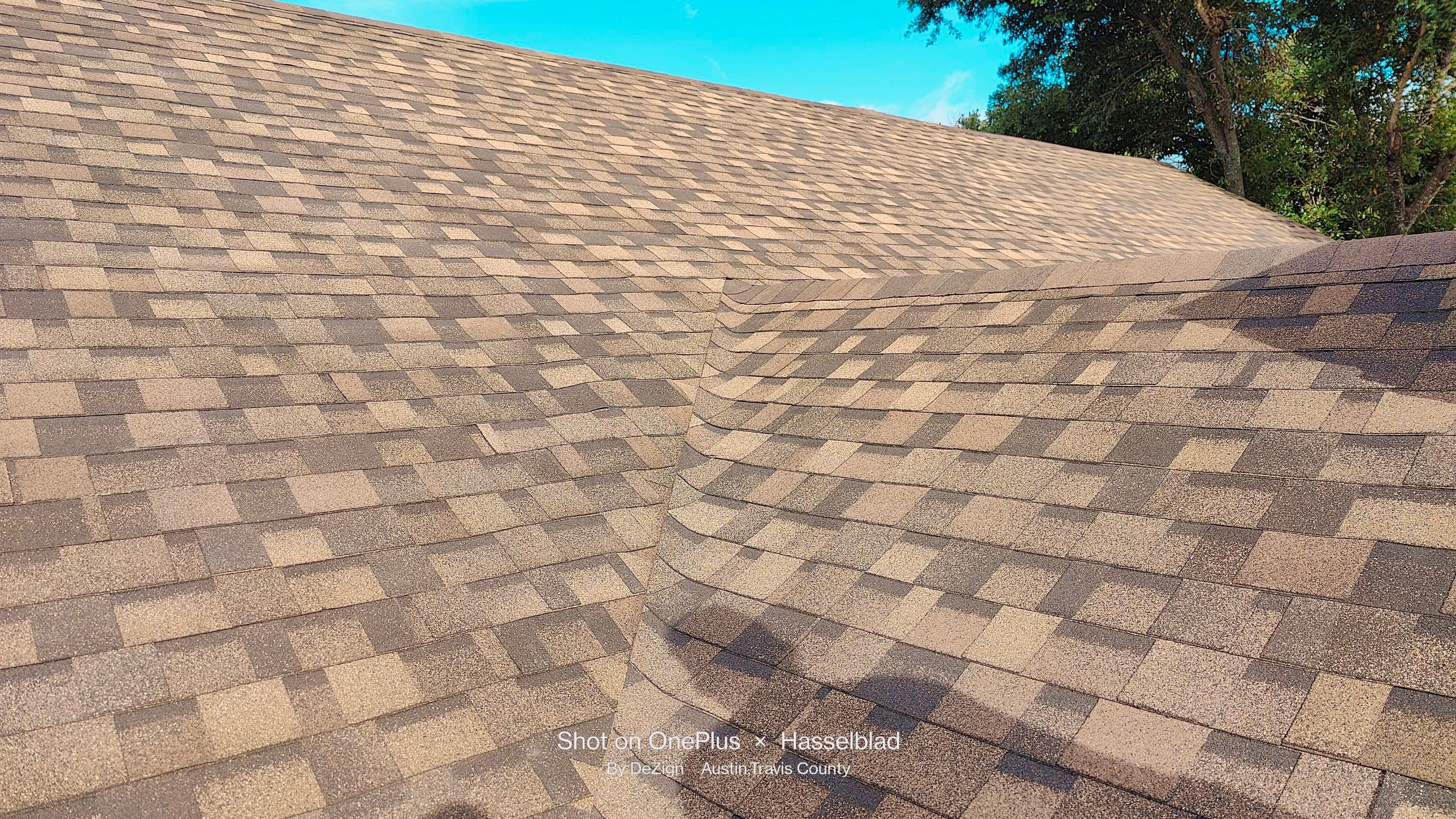 New Roof Installation Of IKO Dynasty Color Brownstone by DeZign Roofing & Exteriors