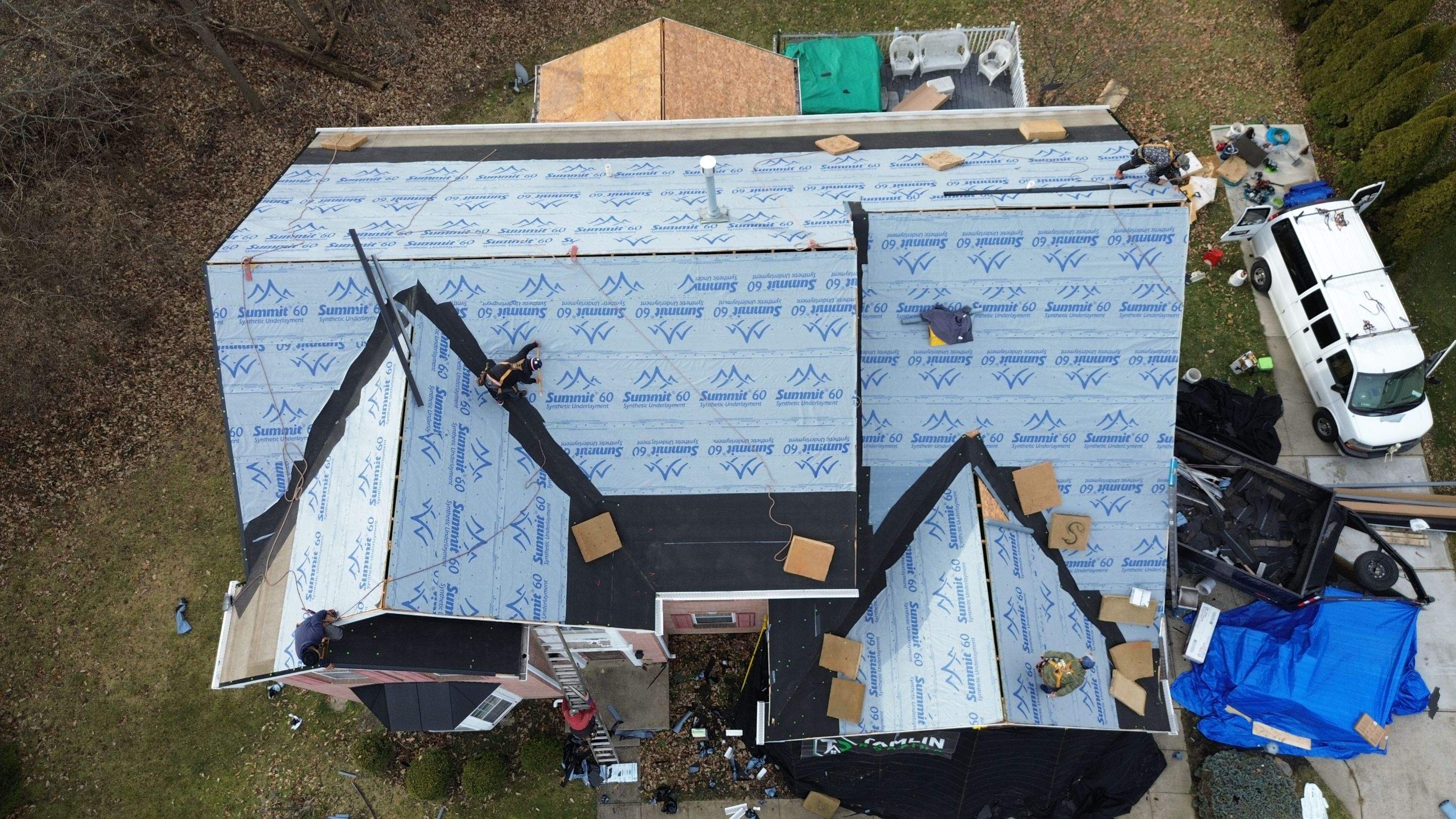 Walden Ponds - Pristine Black and Hydro Flo Gutter Guards by Tamlin Roofing