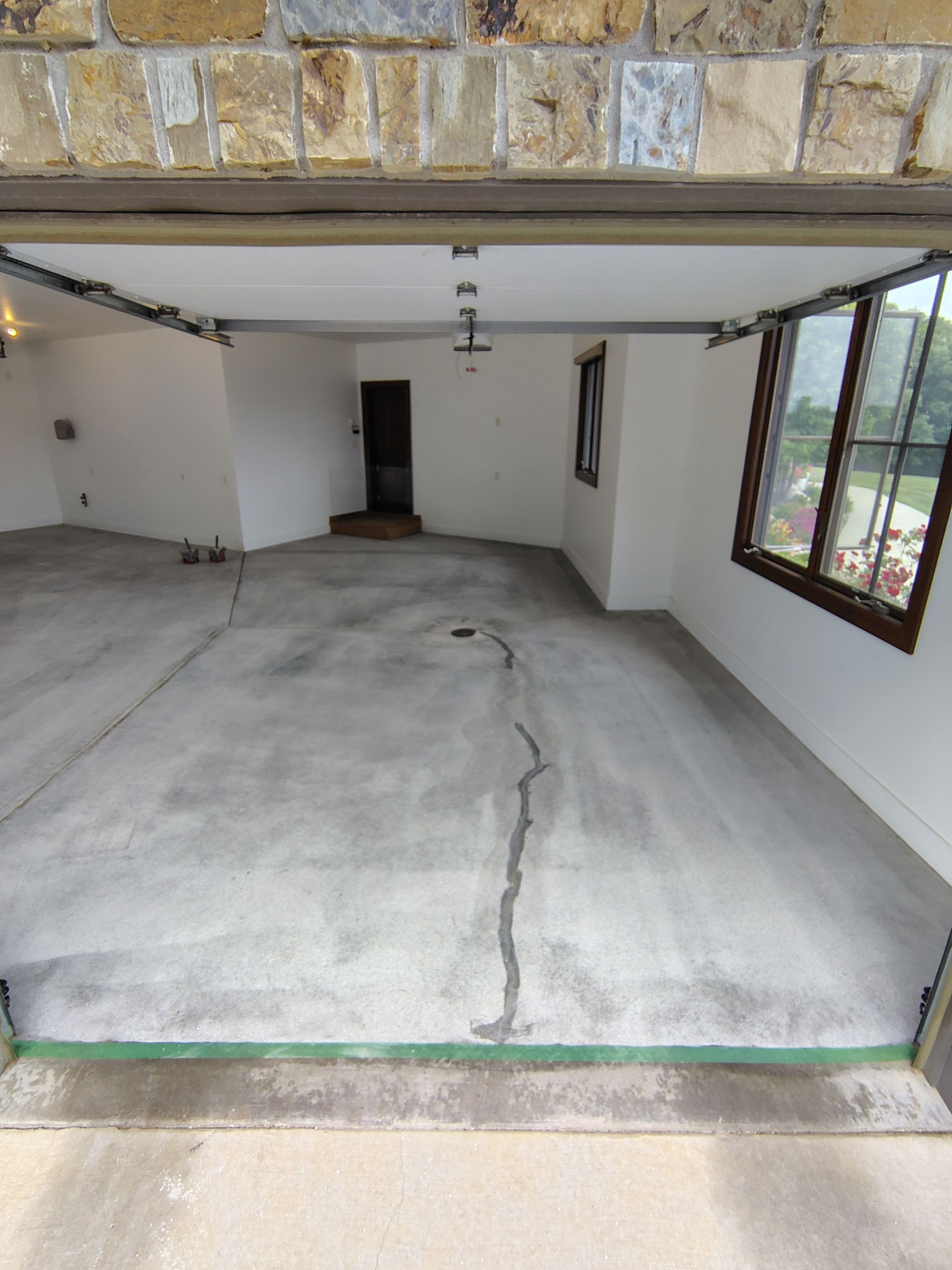 Feather Grey Floor Coating in Sioux Falls, SD by Select Painting, Coatings & Garage Cabinets