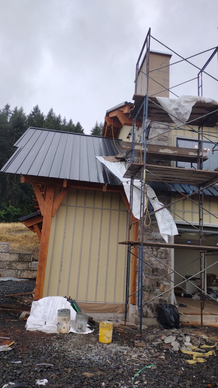 Residential Metal Roof Installation using Taylor Metal Snap Lock Metal Color: Black by Orezona Building & Roofing Company, Inc.