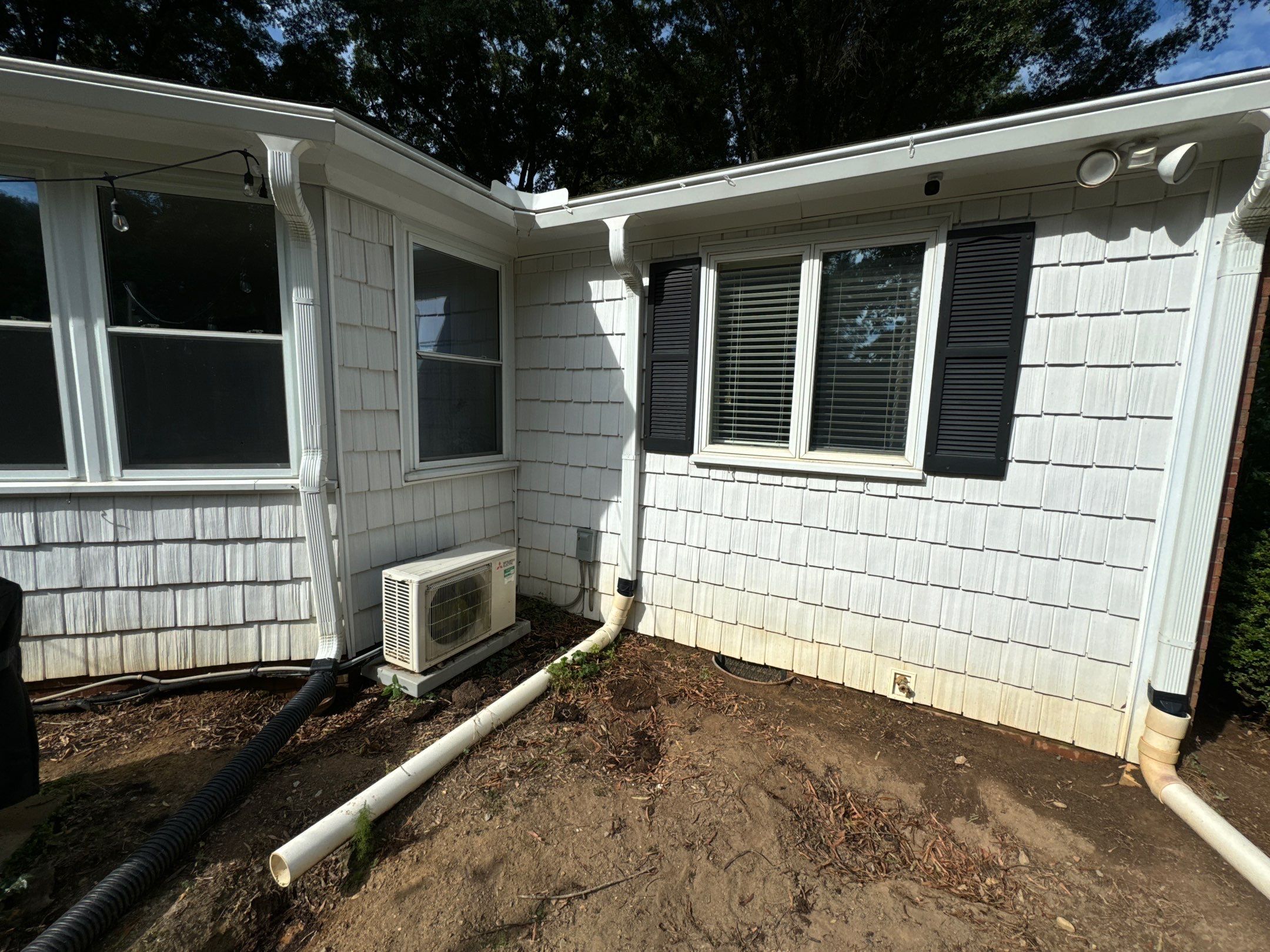 the service being done is cleaning the exterior siding to remove dirt and stains from the surface of the house