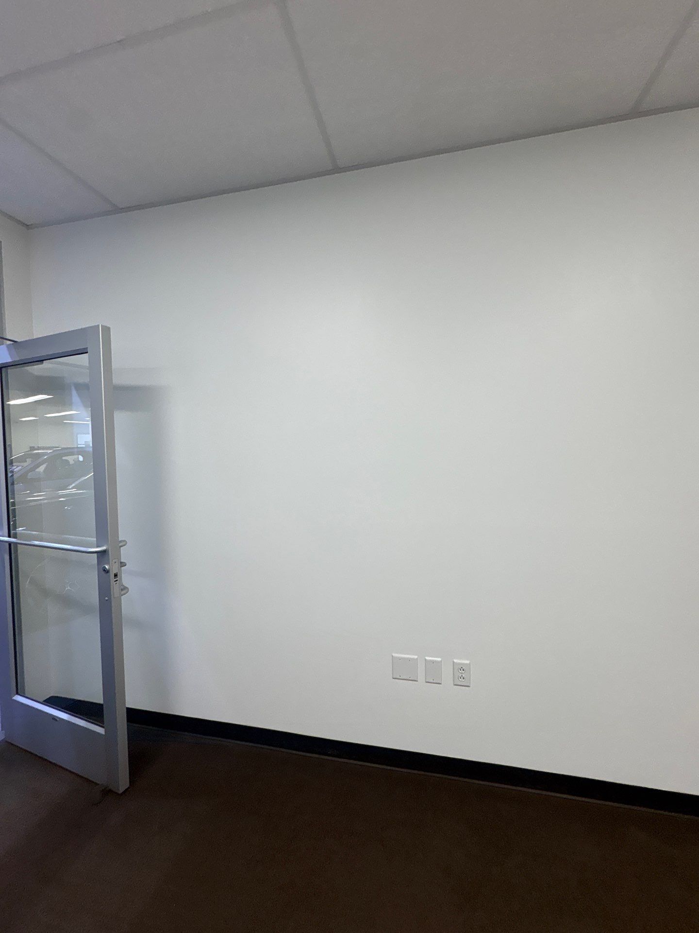 Interior Painting and Drywall Patching for Sioux Falls Commercial Showroom by Select Painting, Coatings & Garage Cabinets