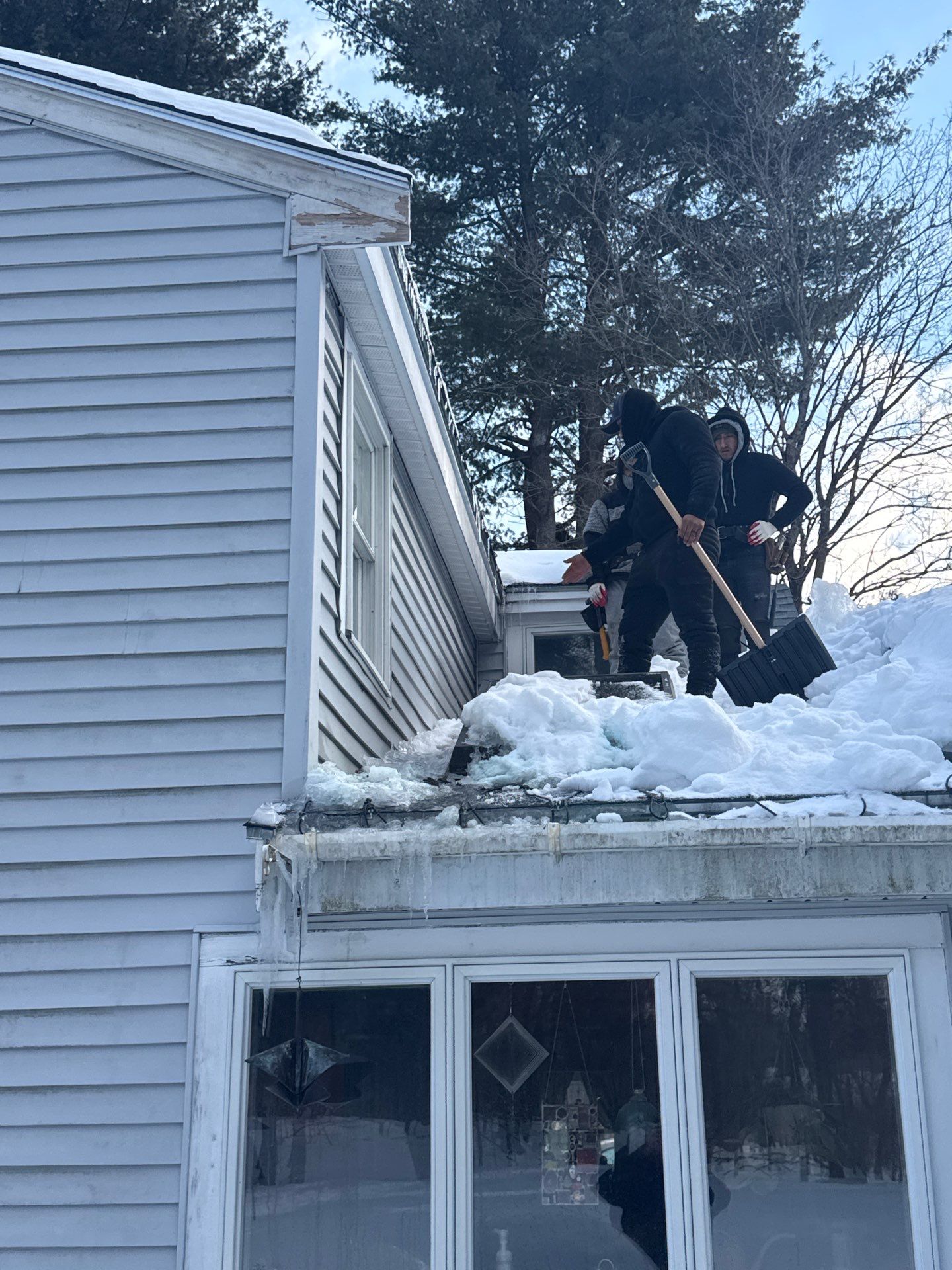 Ice Dam Removal, Snow Removal & Sidewall Flashing Repair in Acton, MA  by Mighty Dog Roofing of Greater Middlesex County