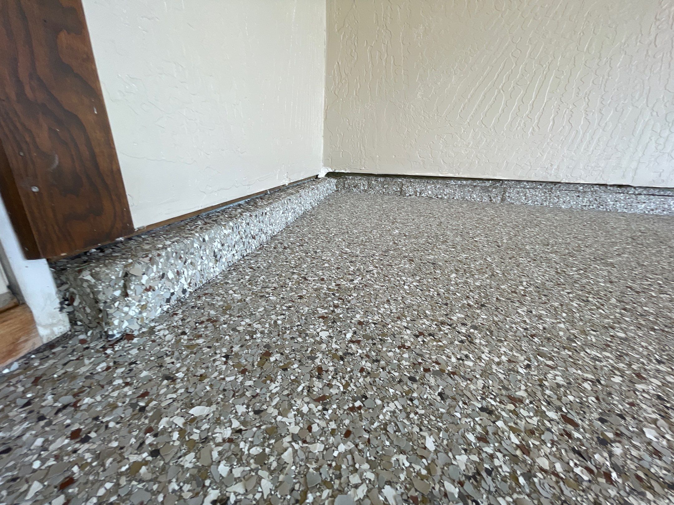 Garage Transformation using Pebble Beach and Front Porch using Greystone by Croc Coatings, LLC
