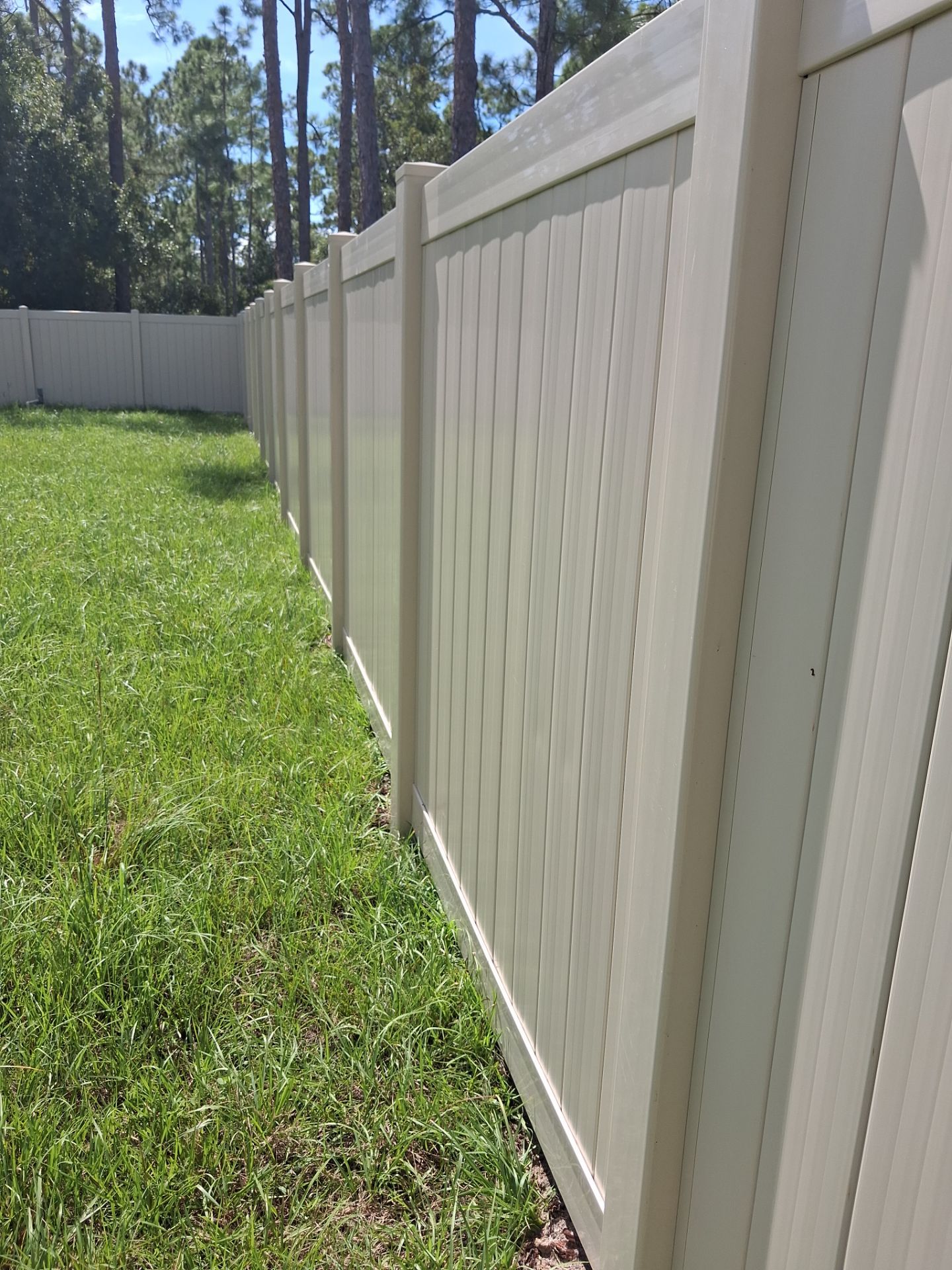 Tan Vinyl Privacy Fence and Gate Installation in Port Charlotte by True Fence LLC
