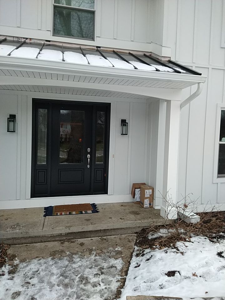 James Hardie Siding  using James Hardie Board and Batten, White by Absolute Roofing and Construction