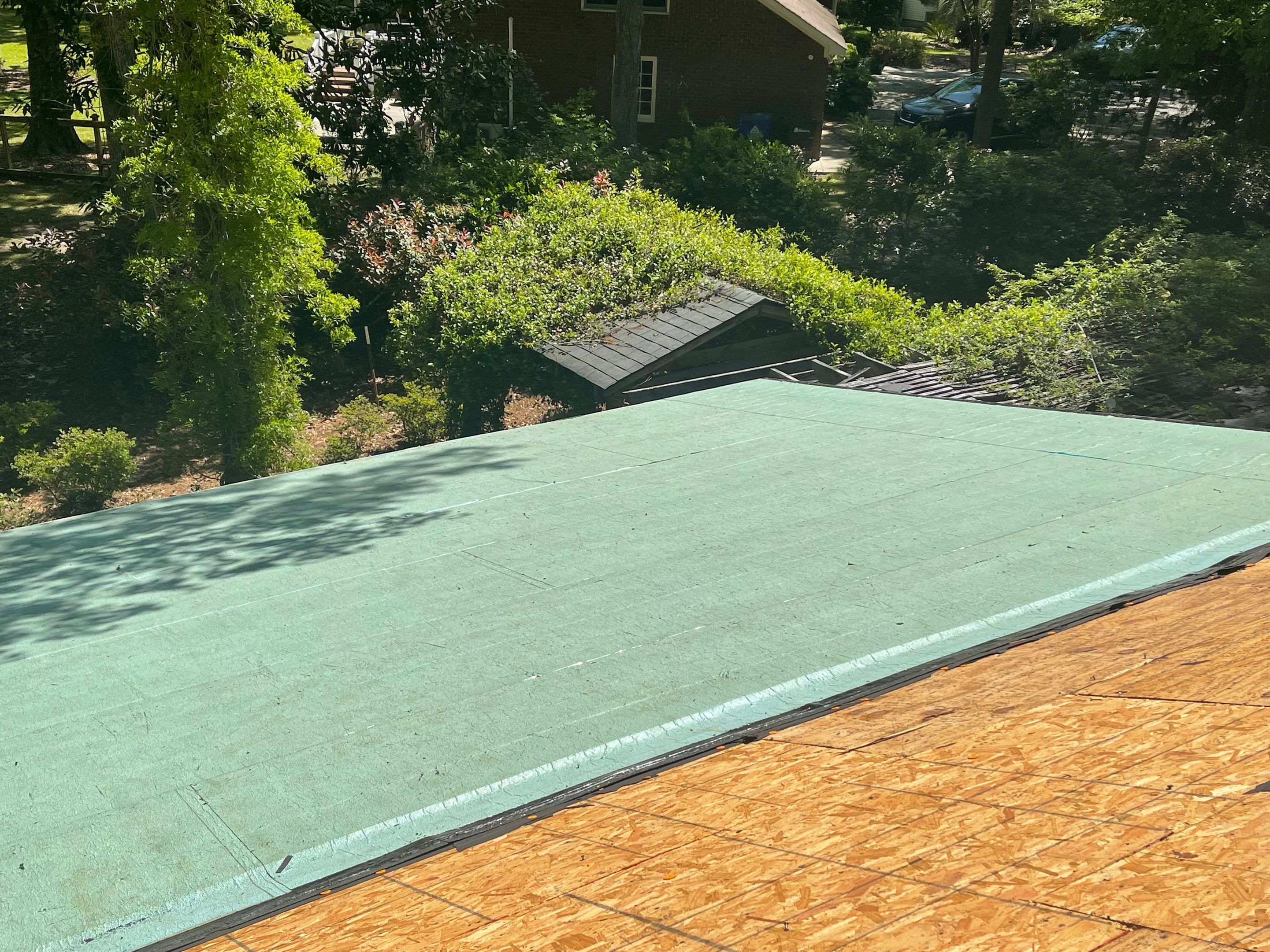 Hail Damage using Atlas Pristine Pinnacle Shingles by Artigues Roofing & Restoration Services