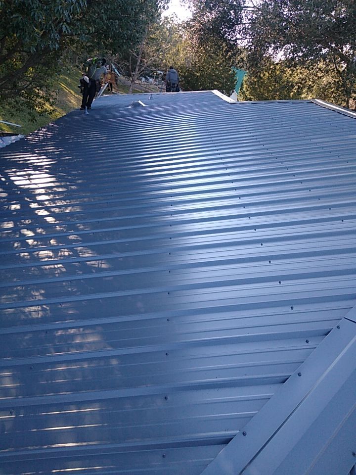 Residential Roofing Installation using Roof Replacement by American Roofing & Construction LLC