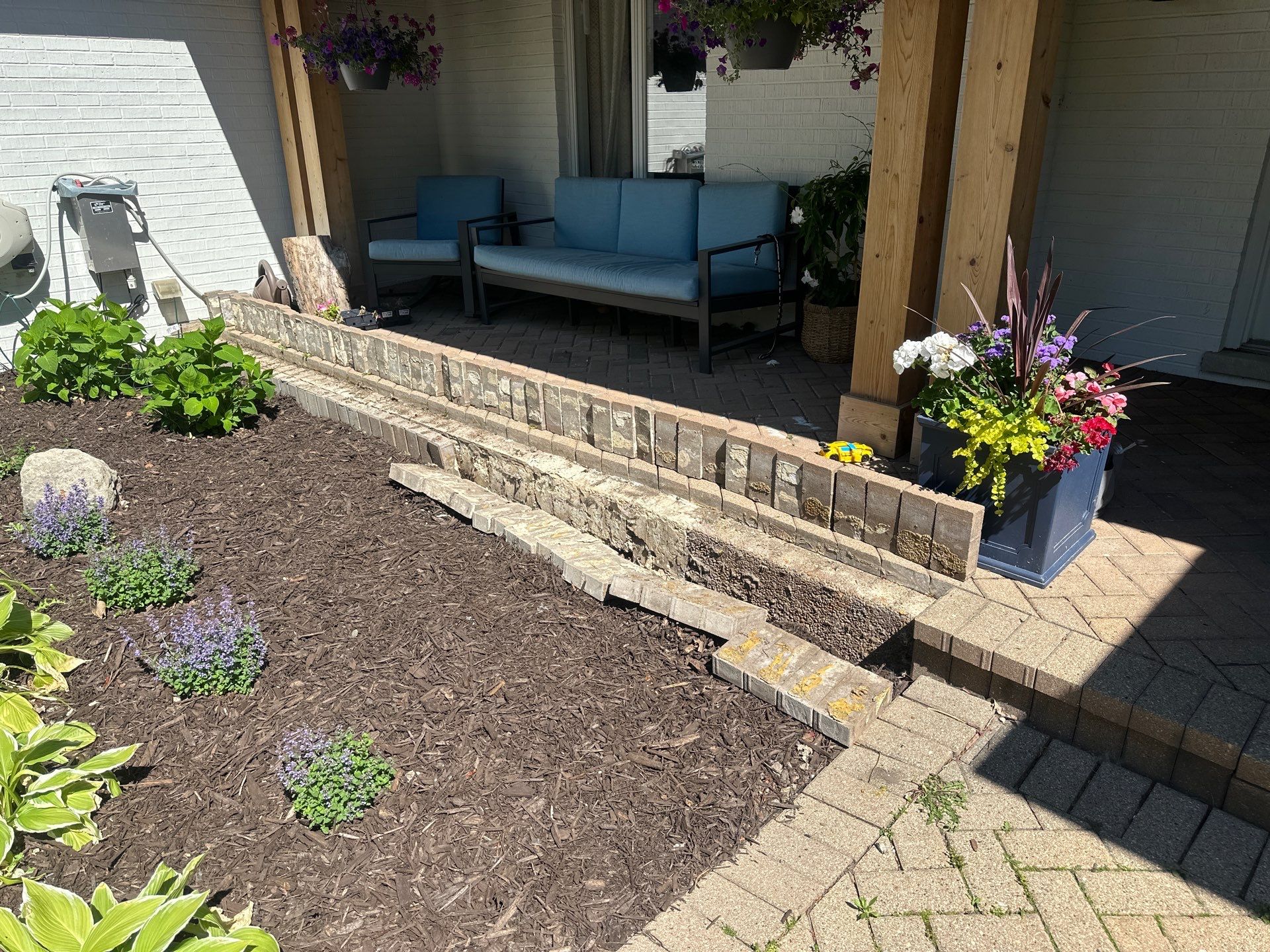 Brick paver repair, cleaning and sealing by Northern Power Washing LLC.