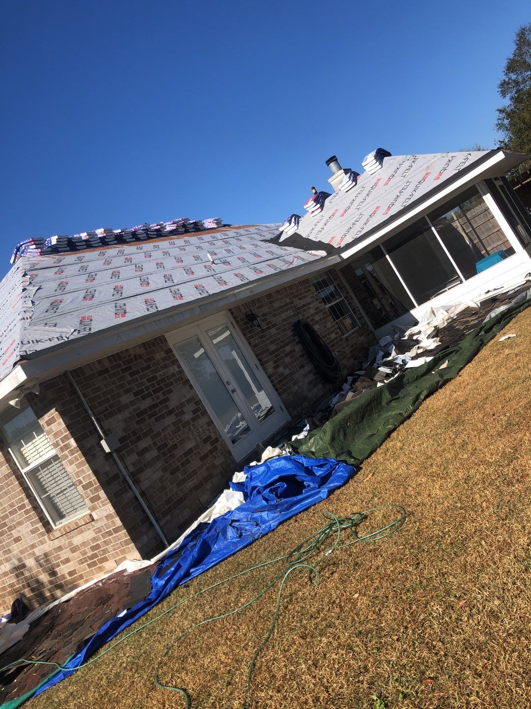Residential Roofing Installation using Roof Replacement by American Roofing & Construction LLC