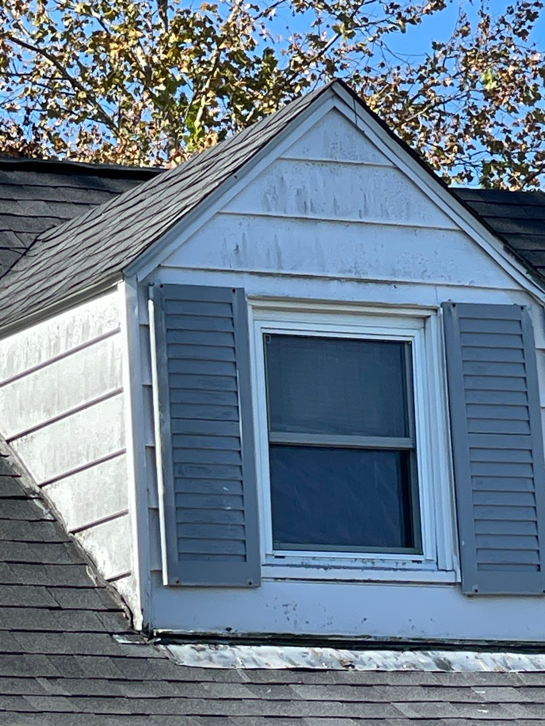 Residential Roofing Installation using Tamko Titan and aluminum siding repair by Storm Contracting 