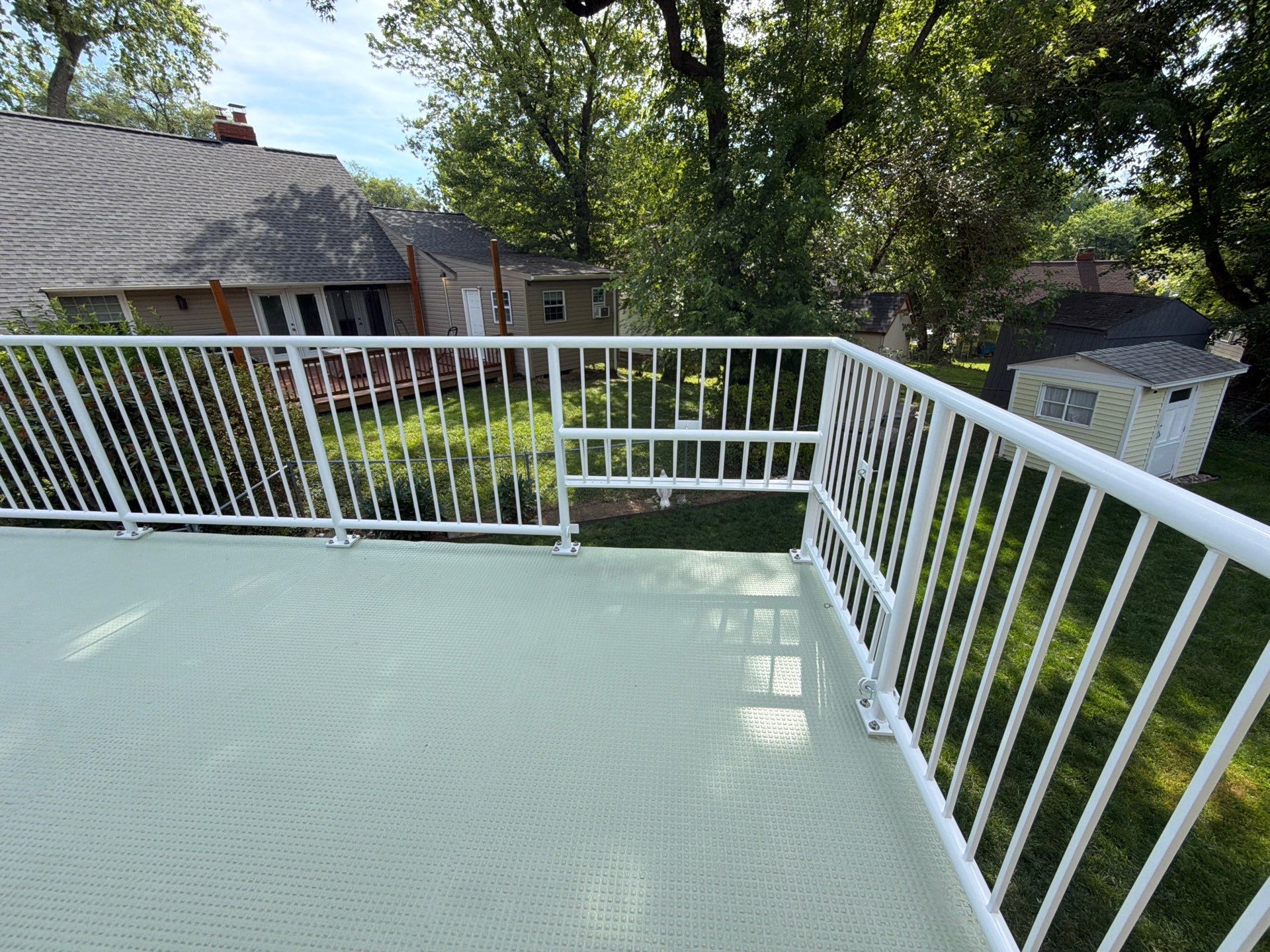 White Powder-Coated Outdoor Railings in Rockville & Staircase and Deck Refurbishment  by Capitol Iron Works