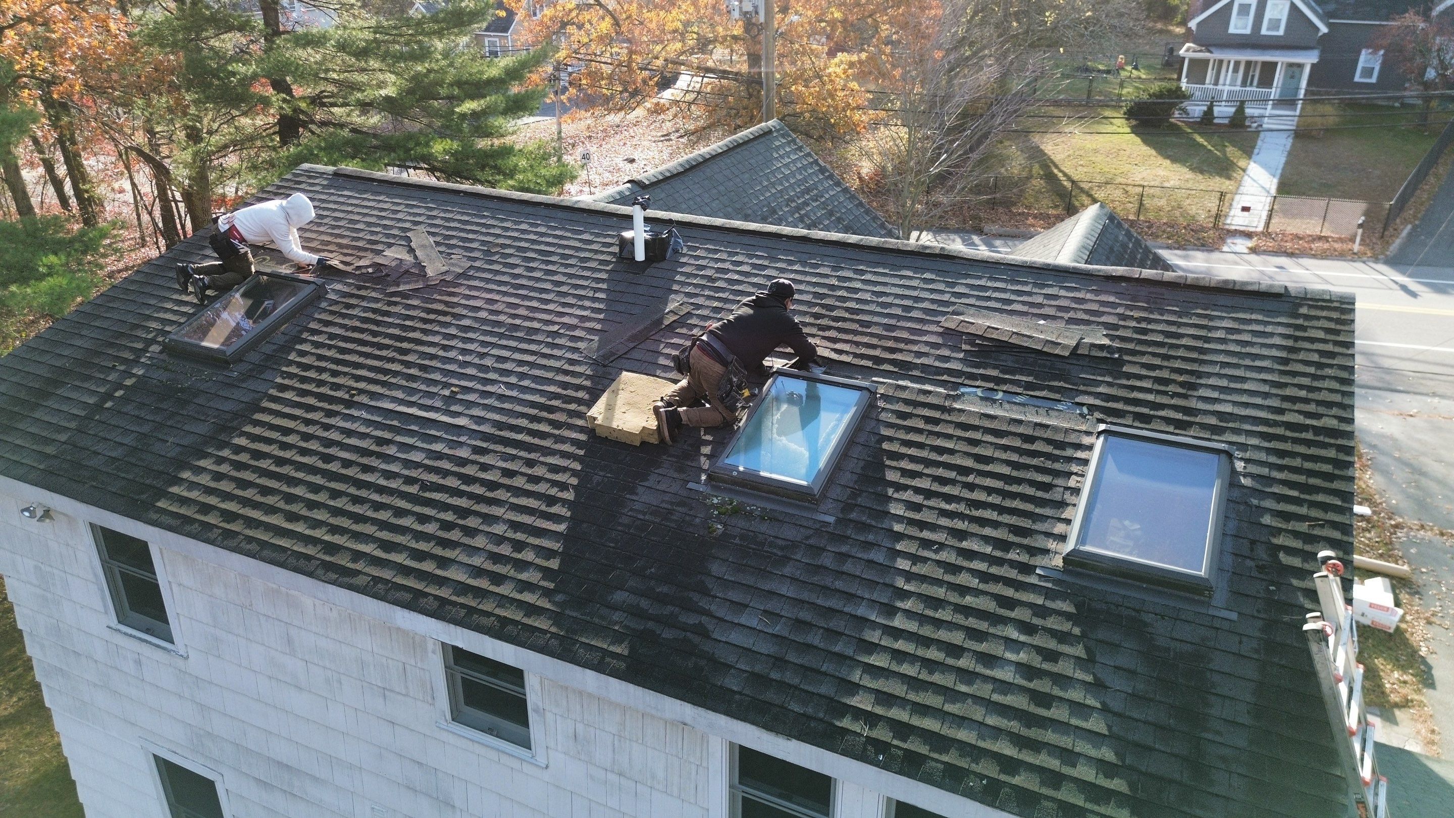 Chelmsford Triple Skylight Leak Repair with Fascia & Shingle Restoration by Mighty Dog Roofing of Greater Middlesex County