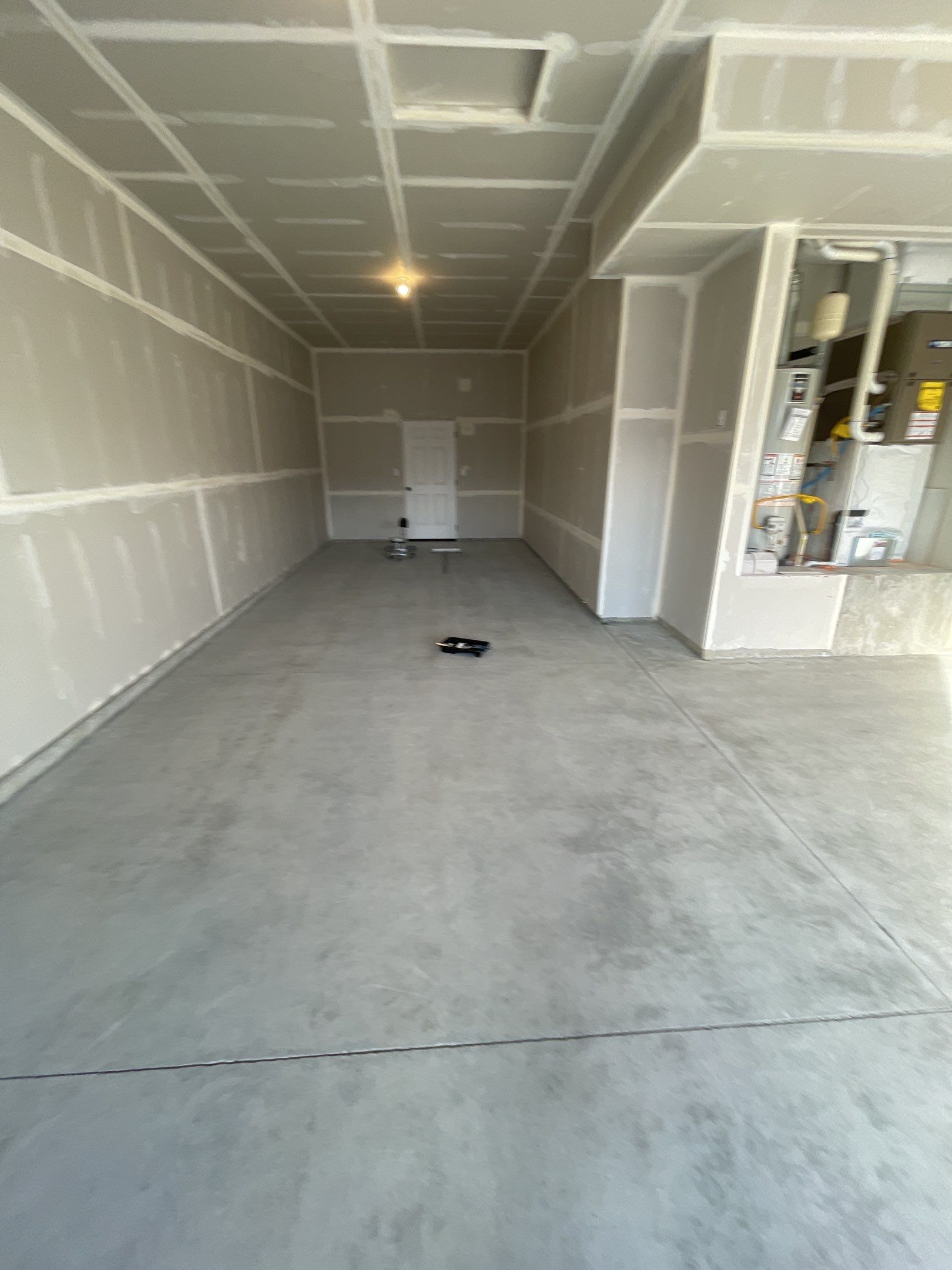 Garage Transformation using Domino by Croc Coatings, LLC