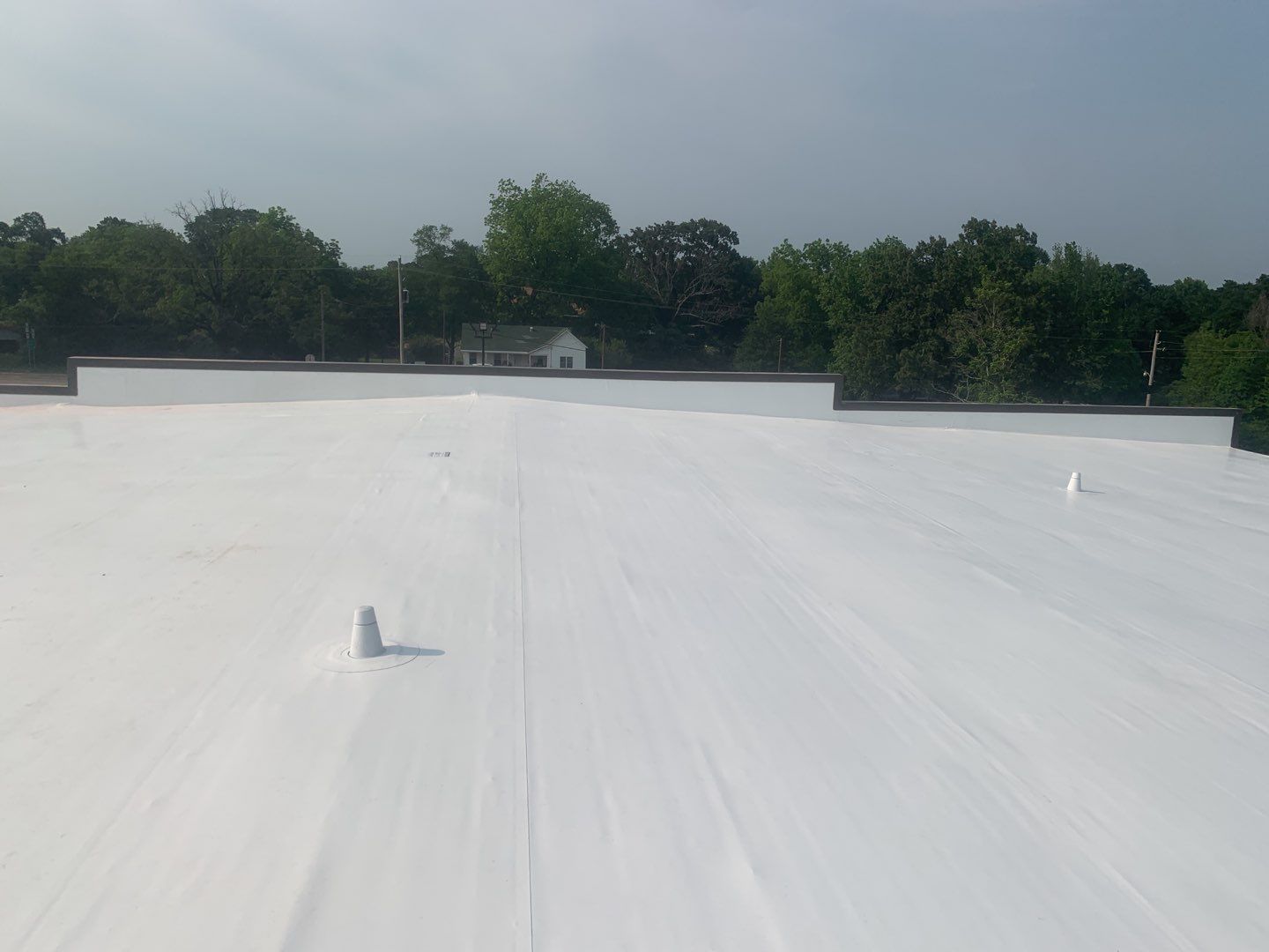 Commercial Roofing Installation using 50 mil PVC by Hostetler Roofing