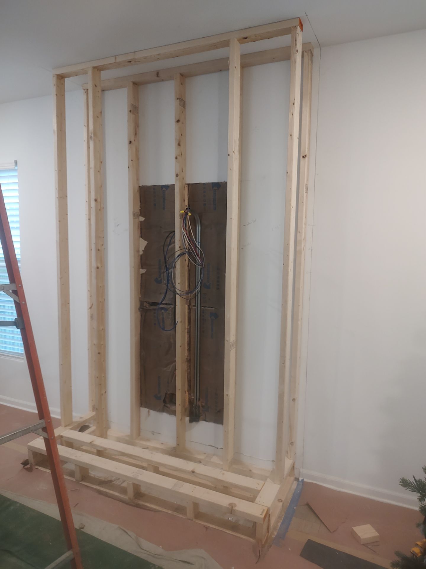 Electric Fireplace & Stone Veneer Installation by Leonard and Sons Building Services, Inc.