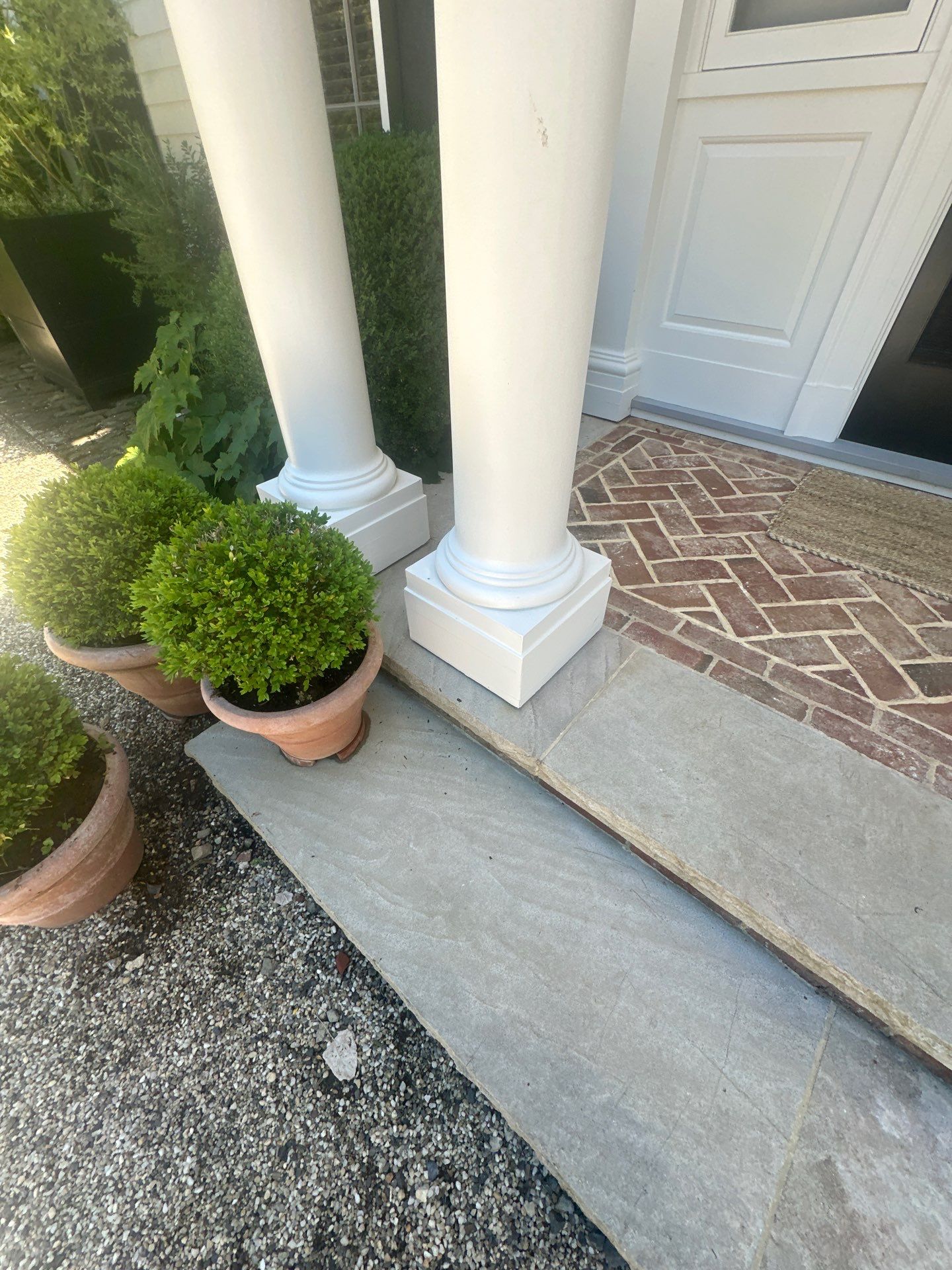 Residential Exterior Renovation Featuring Custom Masonry and Porch Restoration by Pure Incs