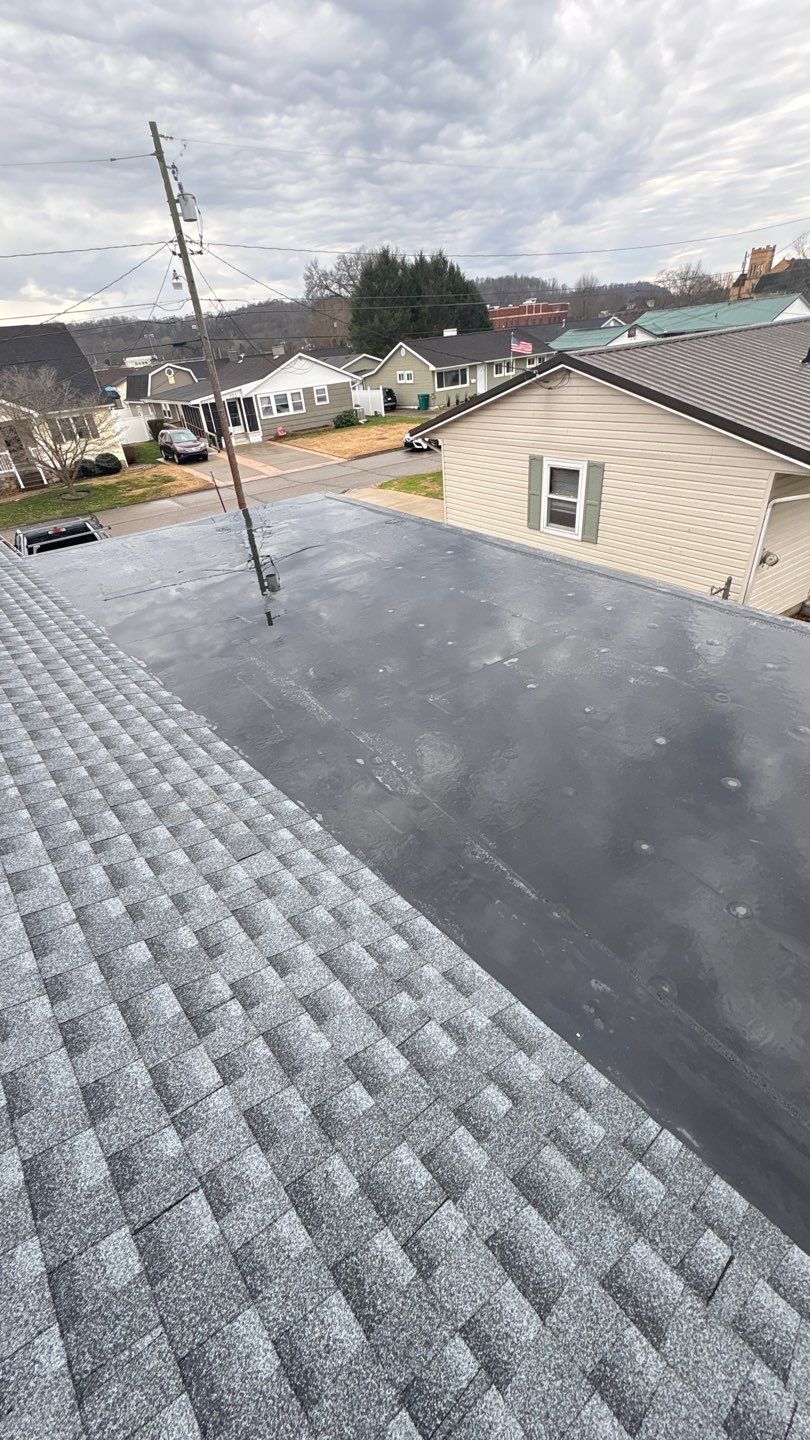 Residential Roofing Installation using EPDM and GAF Timberline HDZ Hickory by Rainstoppers Roofing