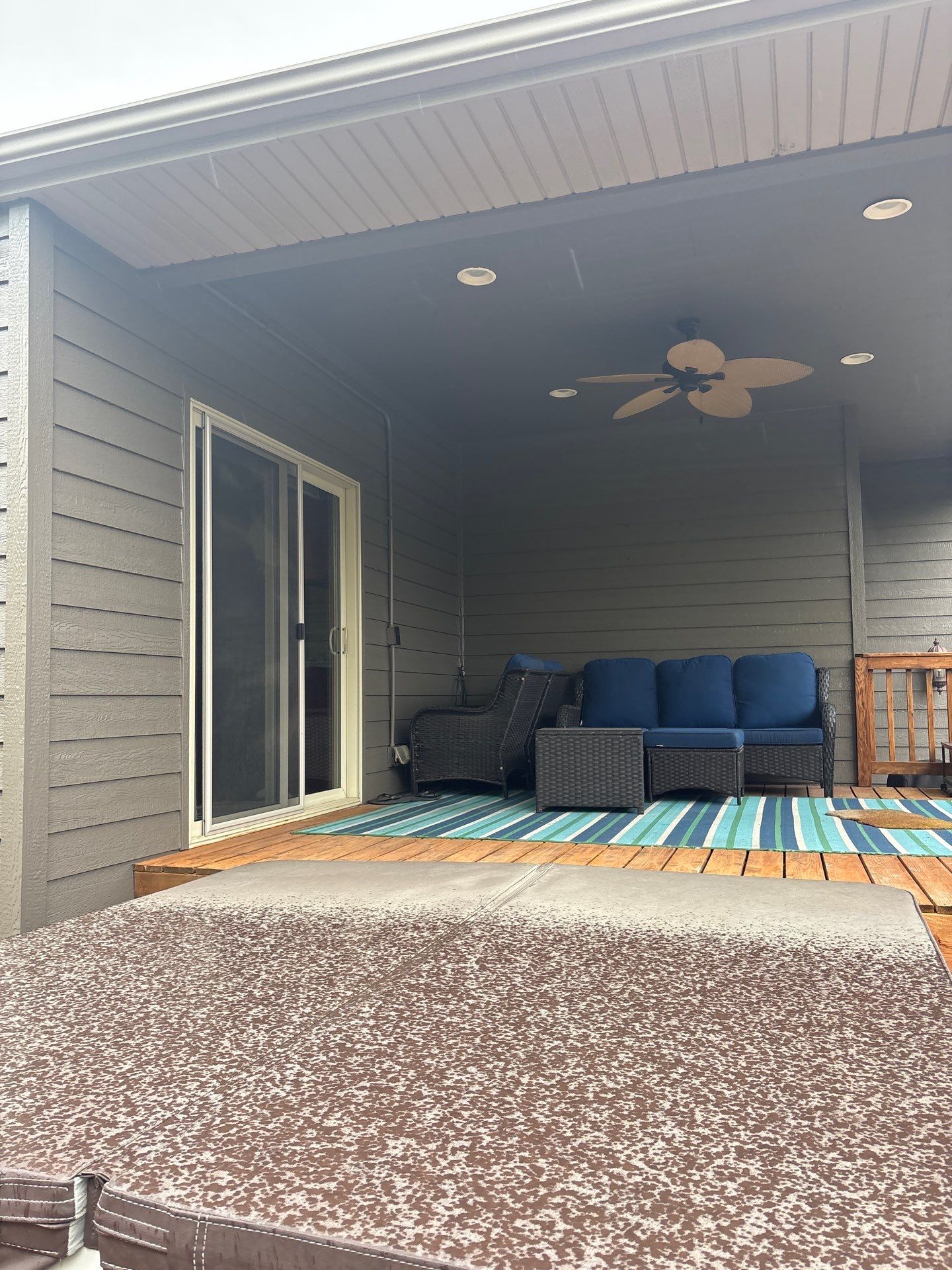 Sioux Falls Residential Exterior Update and Flagstone Pool Deck by Select Painting, Coatings & Garage Cabinets