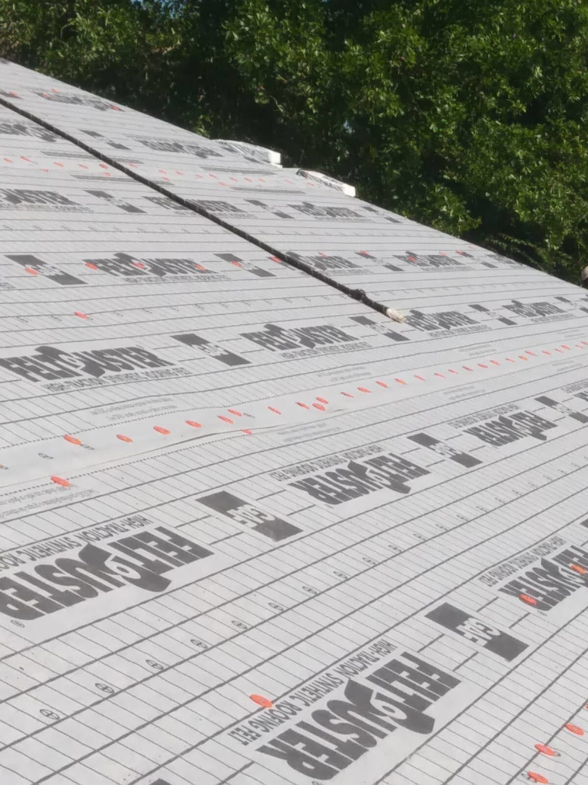 Residential Roofing Installation using Roof Replacement by American Roofing & Construction LLC