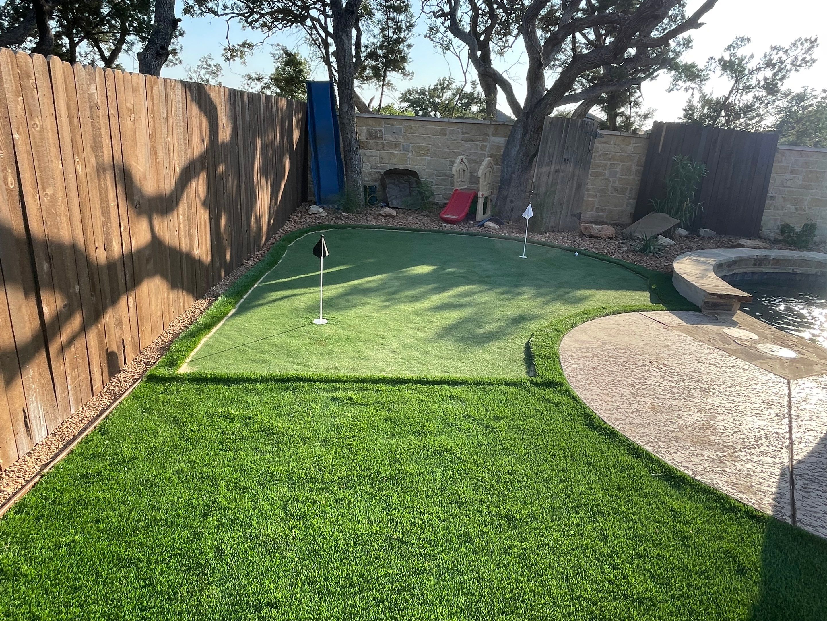 Turf Play Area around Pool by Singer Services