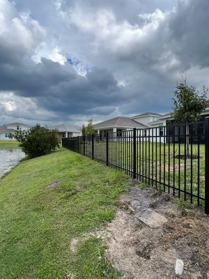 Aluminum Fence Installation using Black 3 Rail Aluminum Fence