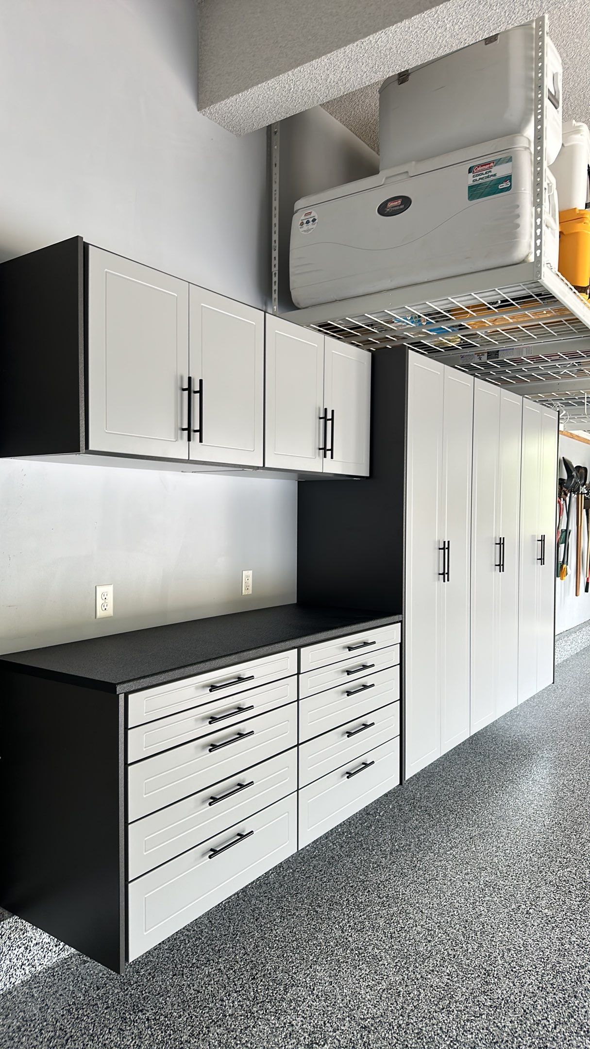 Matt N. took his garage to the next level with our Domino floor and cabinets  by Banner Garage