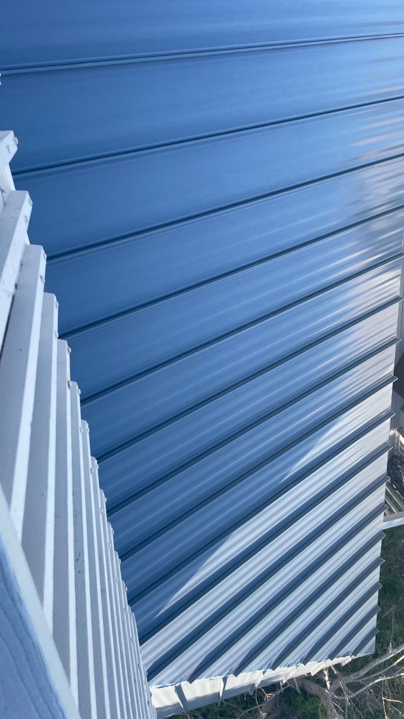 Residential Roofing Installation using Gulf Coast Metals Gulf Seam Panels by Four Peaks Roofing