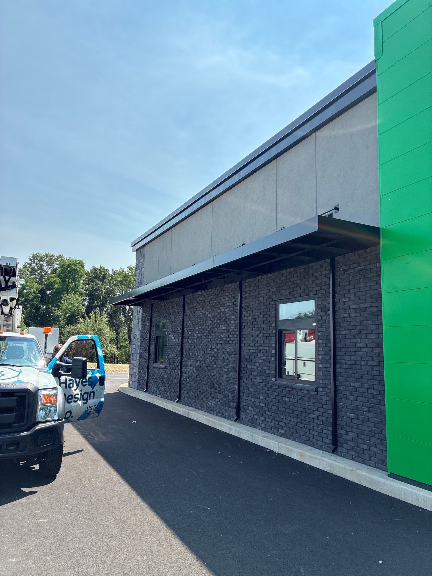 Subway Awning Installation in Granger by Hayes Design co