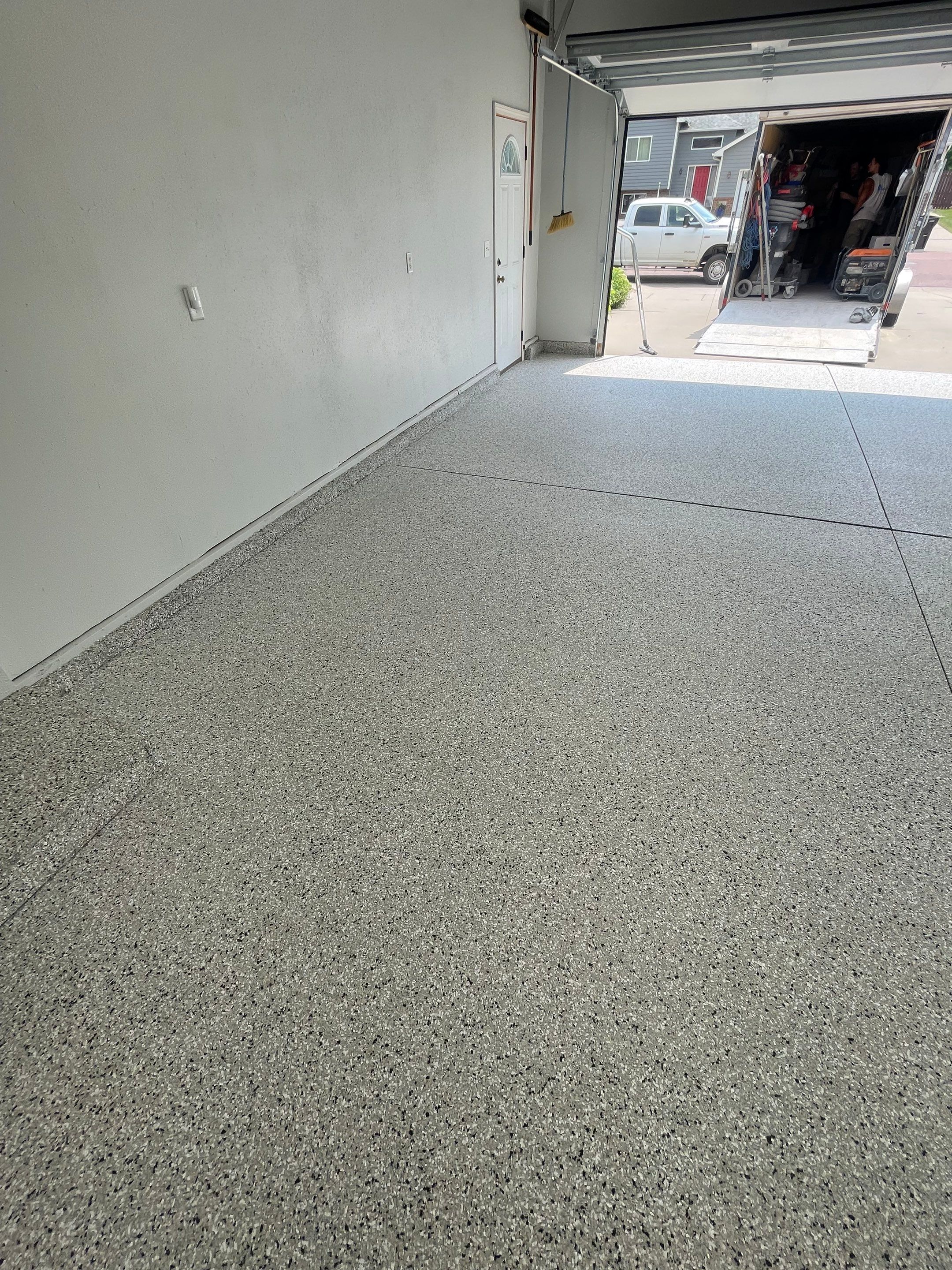 Multi-Car Garage Floor Coating and Crack Repair in Tea by Select Painting, Coatings & Garage Cabinets