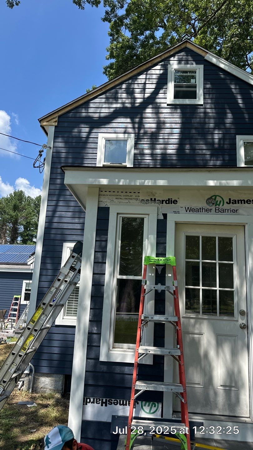 James Hardie Lap Siding Installation in Chelmsford, MA by Mighty Dog Roofing of Greater Middlesex County