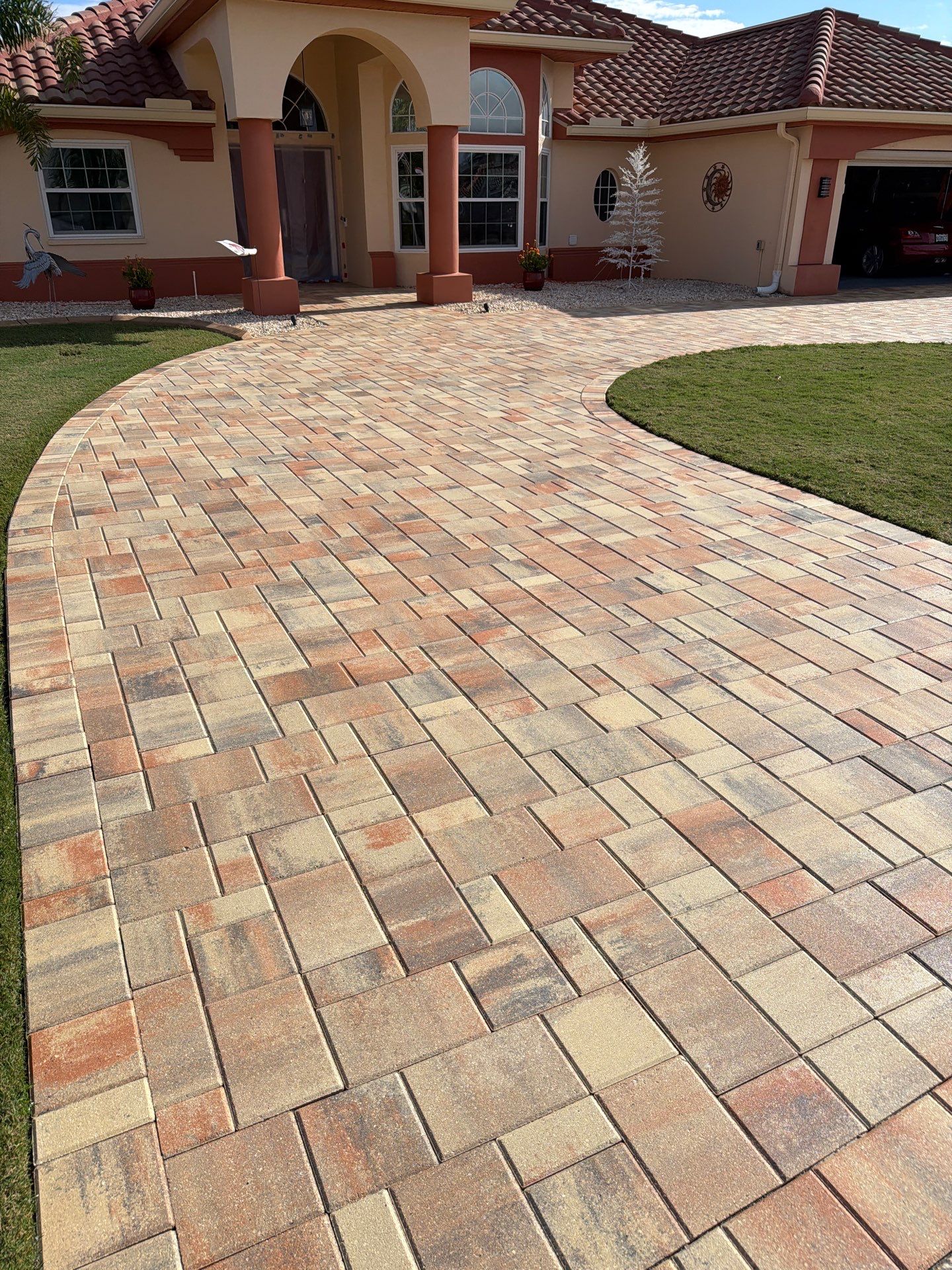 Professional Paver Sealing for this beautiful Driveway in Sun City Center by Supreme Paver Experts