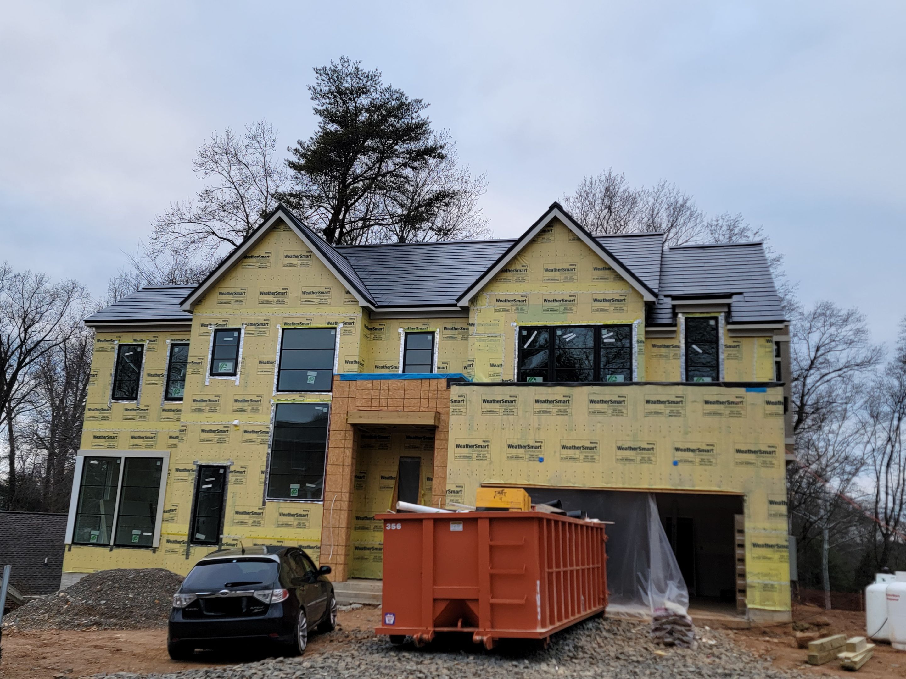 New Construction Tesla Solar Roof by American Home Contractors