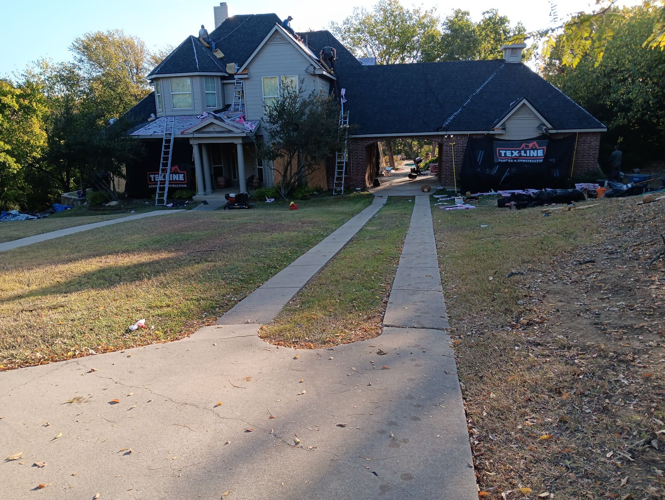 Insurance Claim Roof Paint and Gutters by Tex-Line Roofing