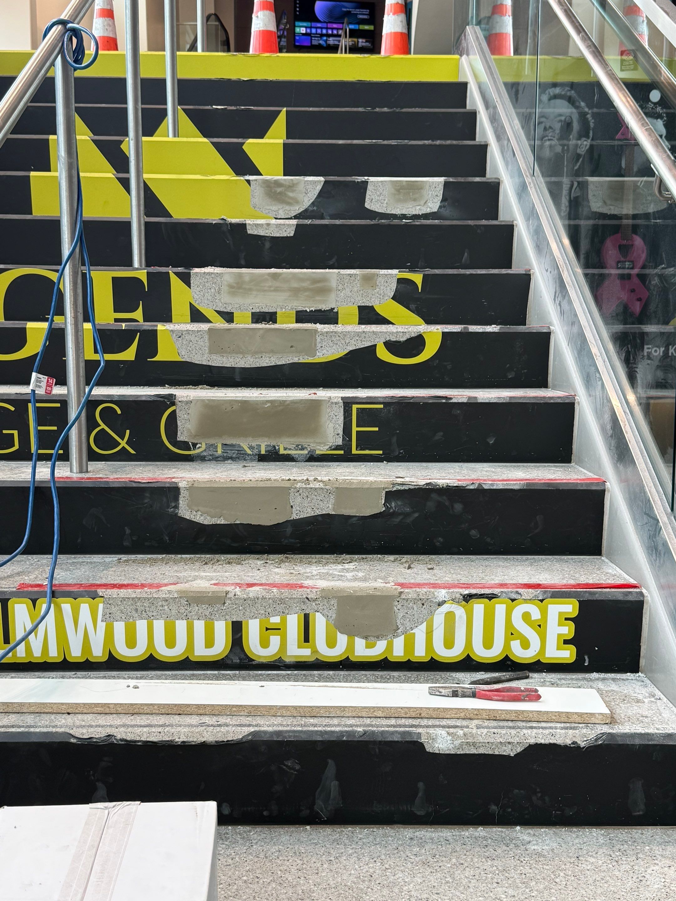 Concrete Stair Tread Restoration and Safety Upgrade in Sioux Falls by Select Painting, Coatings & Garage Cabinets
