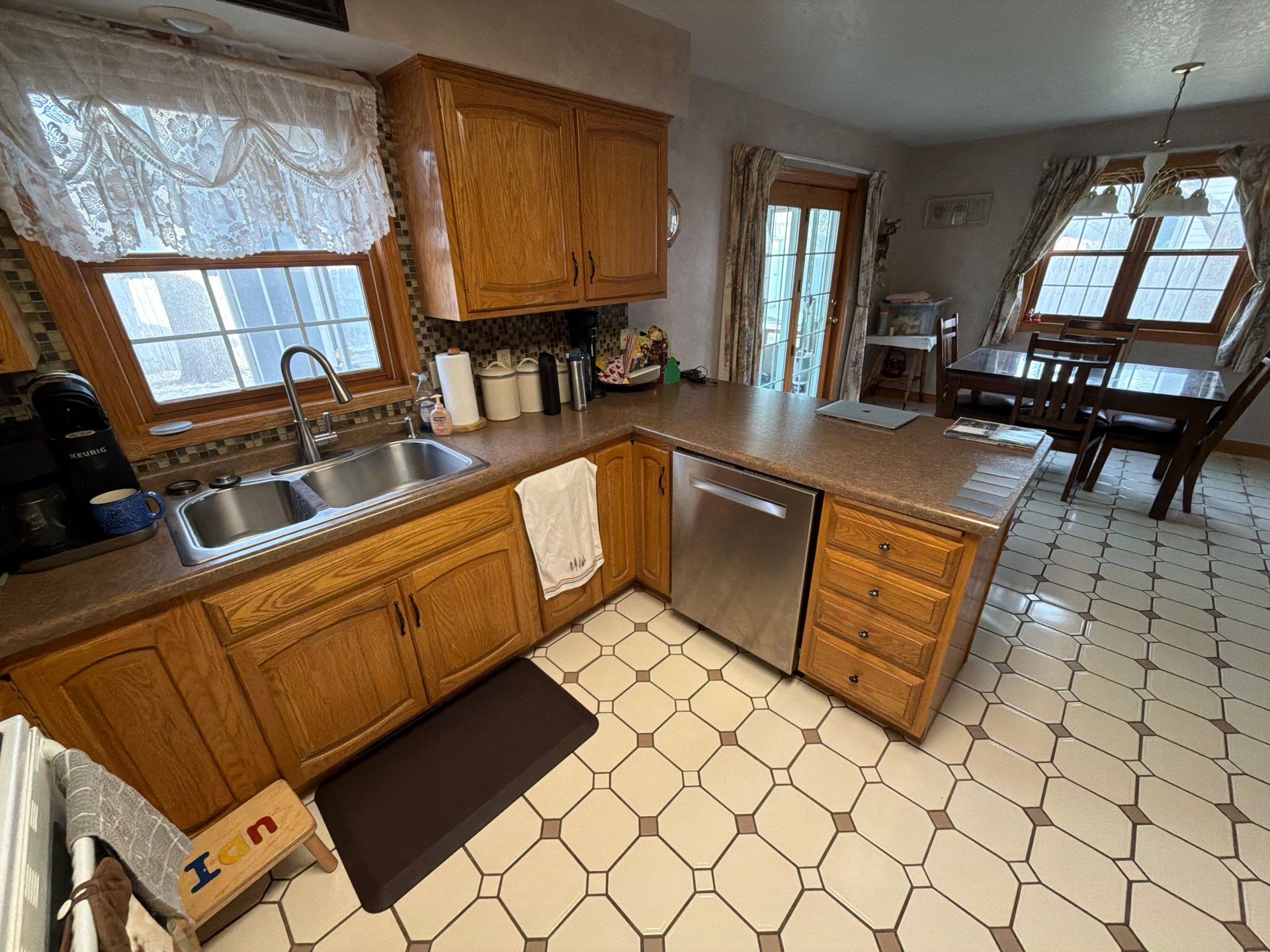 Kitchen Cabinet Painting and Hardware Update in Sioux Falls by Select Painting, Coatings & Garage Cabinets