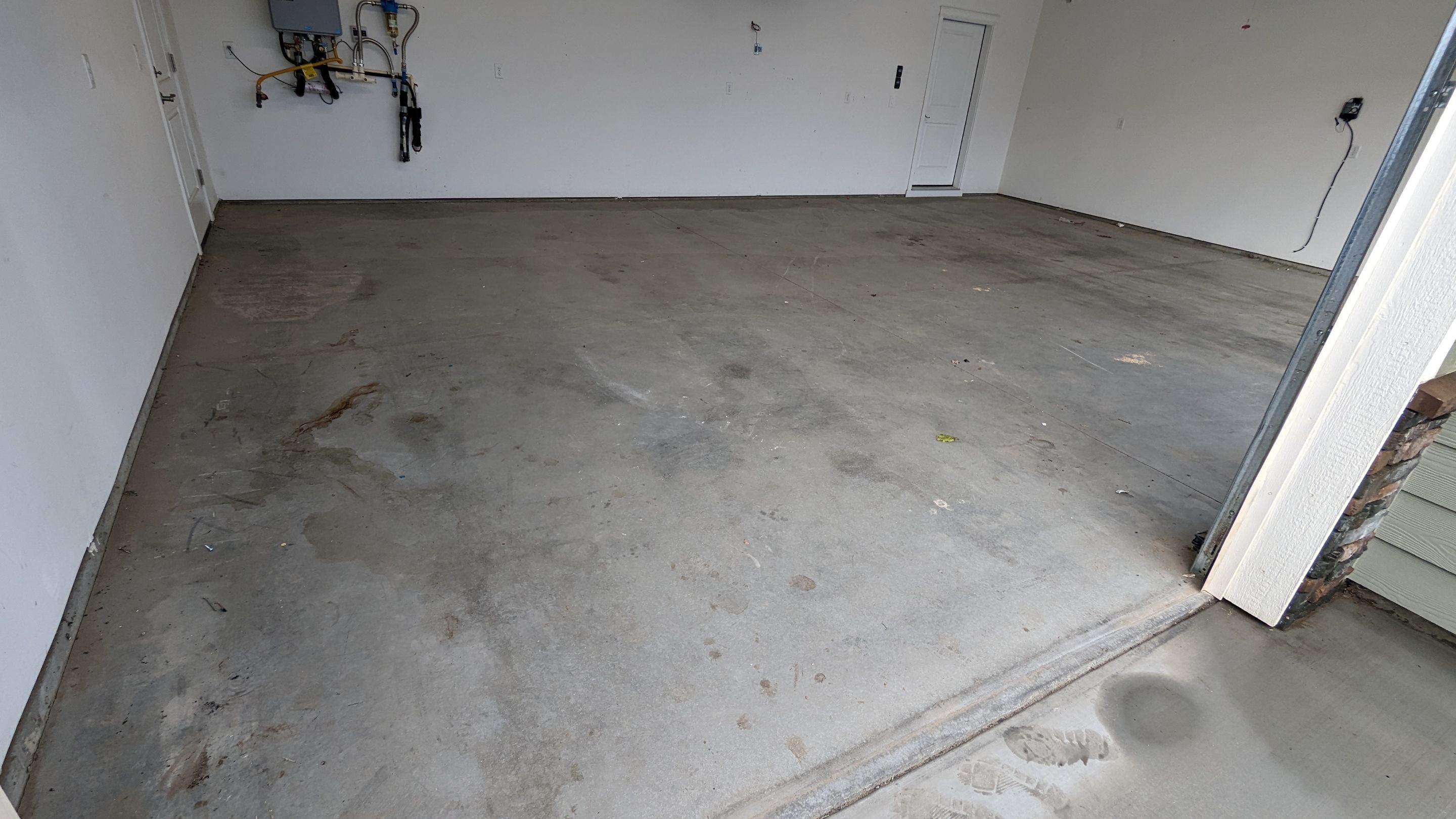 Garage Transformation using Domino with Blue by Croc Coatings, LLC