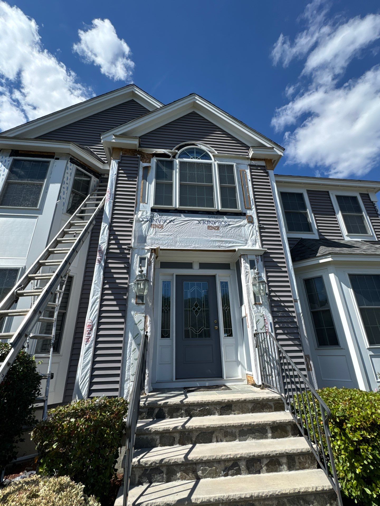 Roof, Trim, Deck, and Gutter Restoration by Mighty Dog Roofing of Greater Middlesex County
