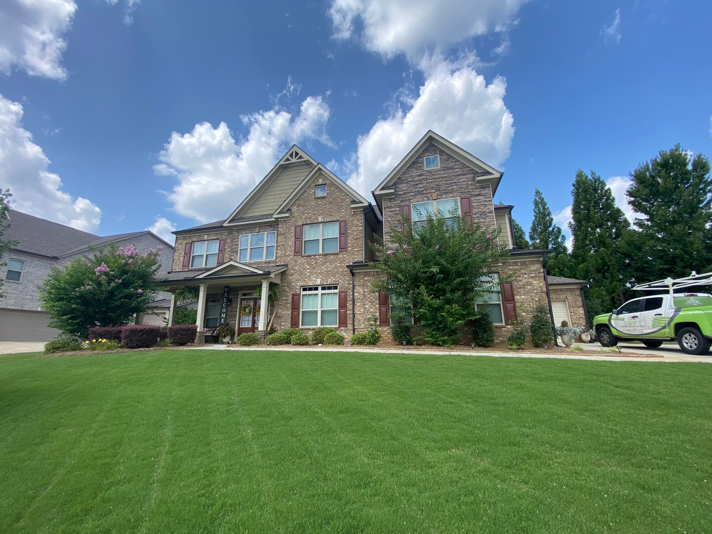 Full Exterior Painting for Brick and Siding Home in Cumming by Swift Home Renovations