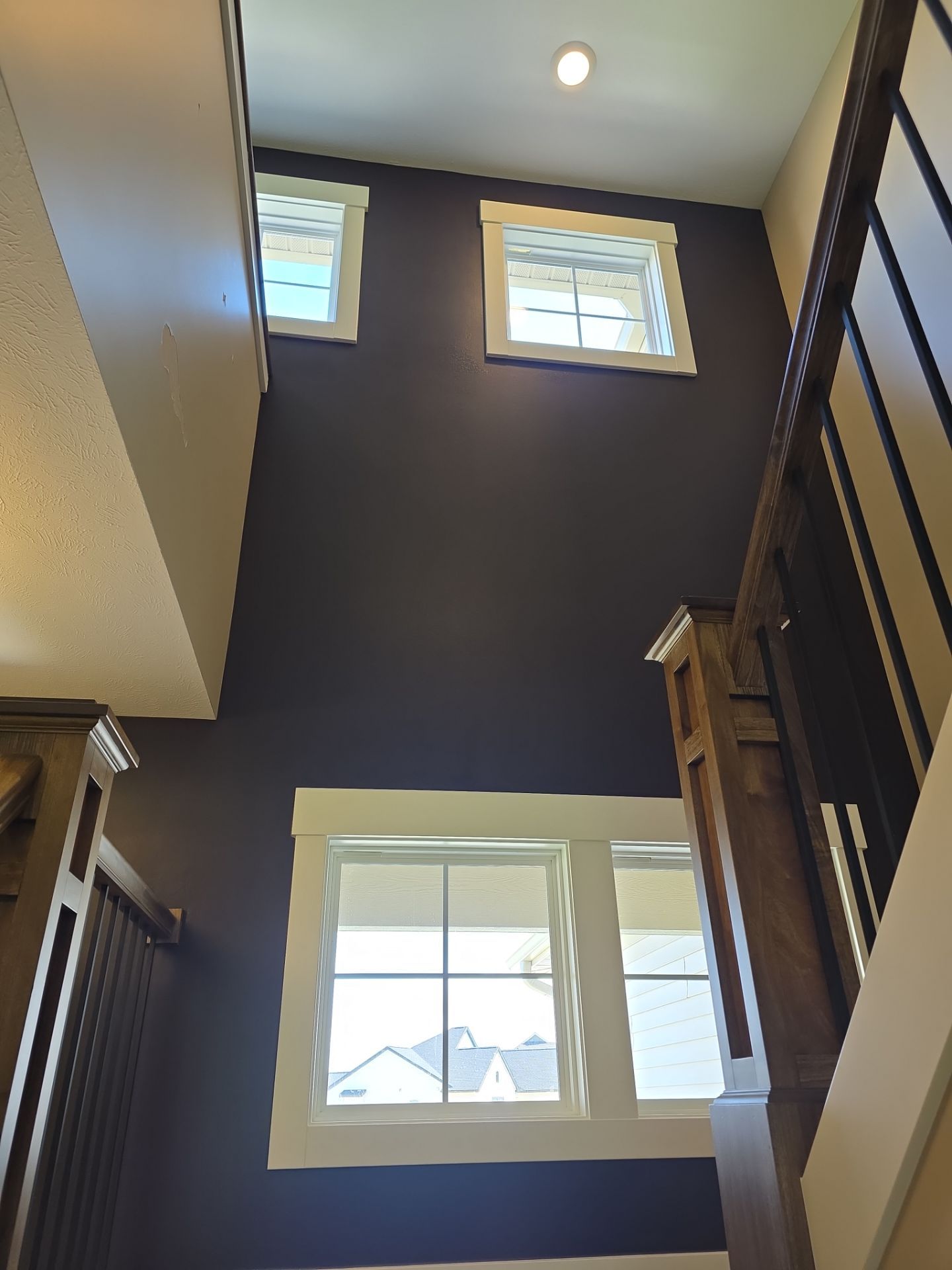 Interior Painting and Two-Story Accent Wall Transformation in Grand Haven by Gordon Painting