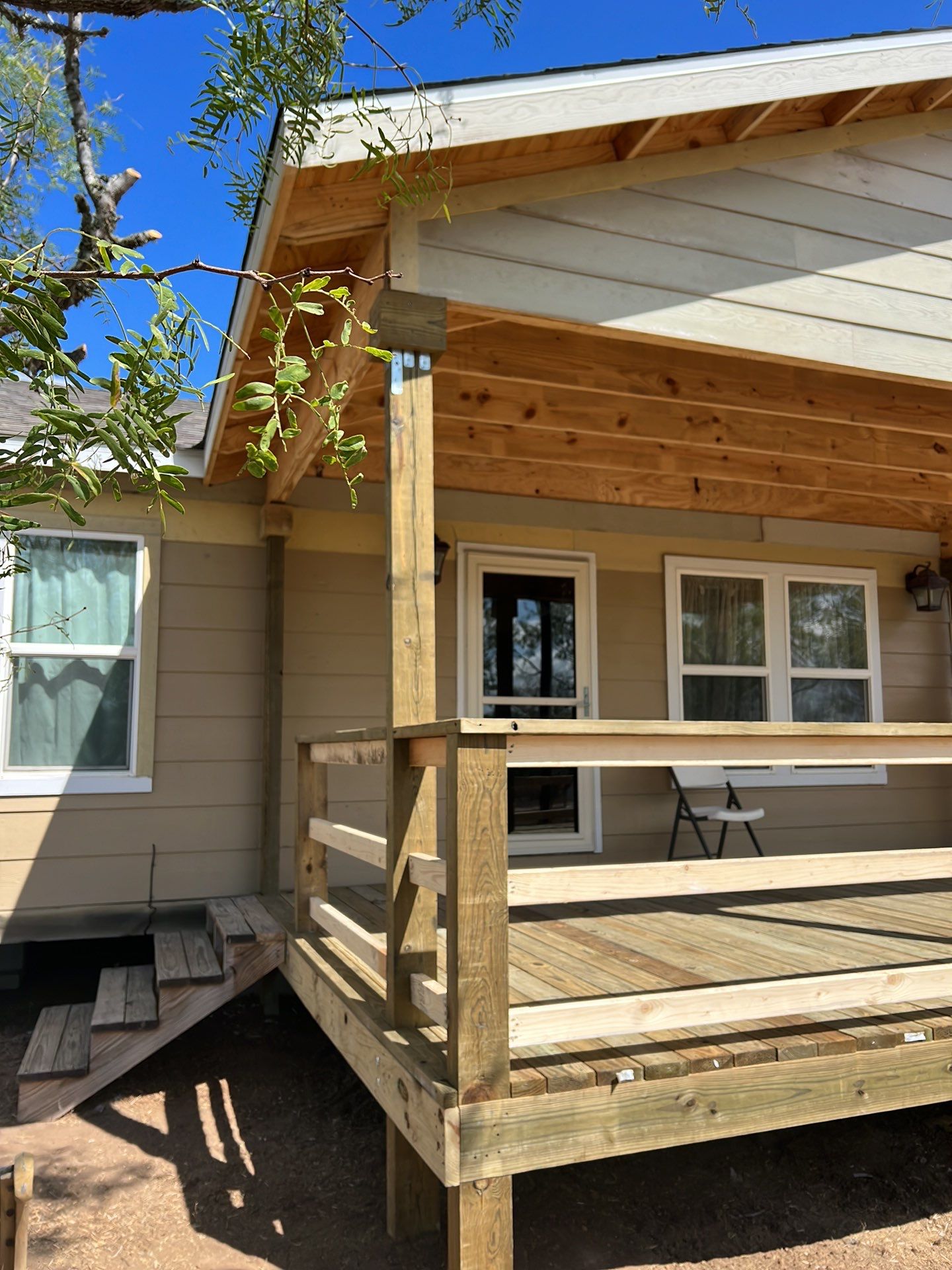 Front Porch Sitt'n by Bayfront Roofing and Construction