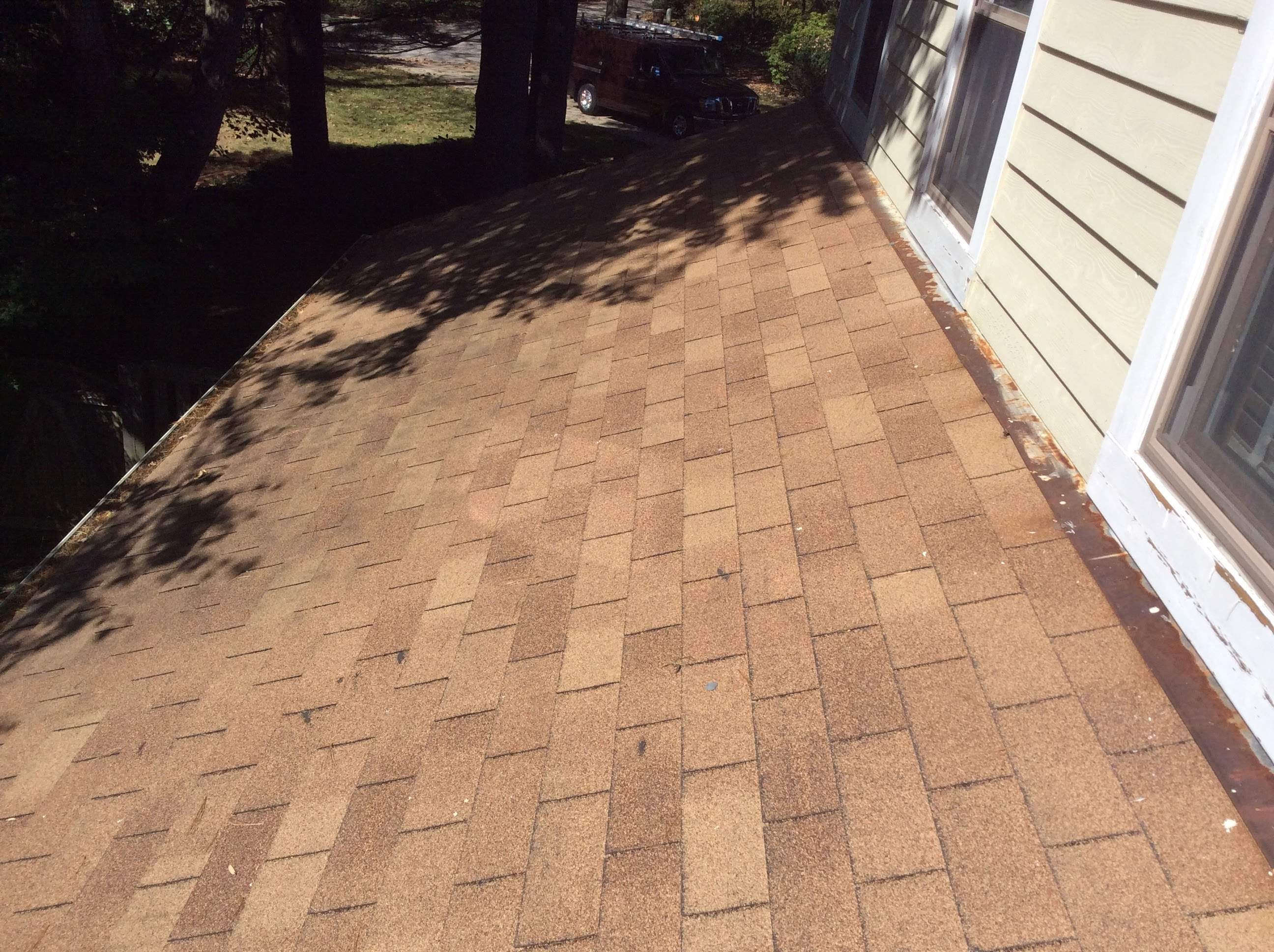 Residential Roofing Installation using Pewterwood Shingles  by Alpha Design Services