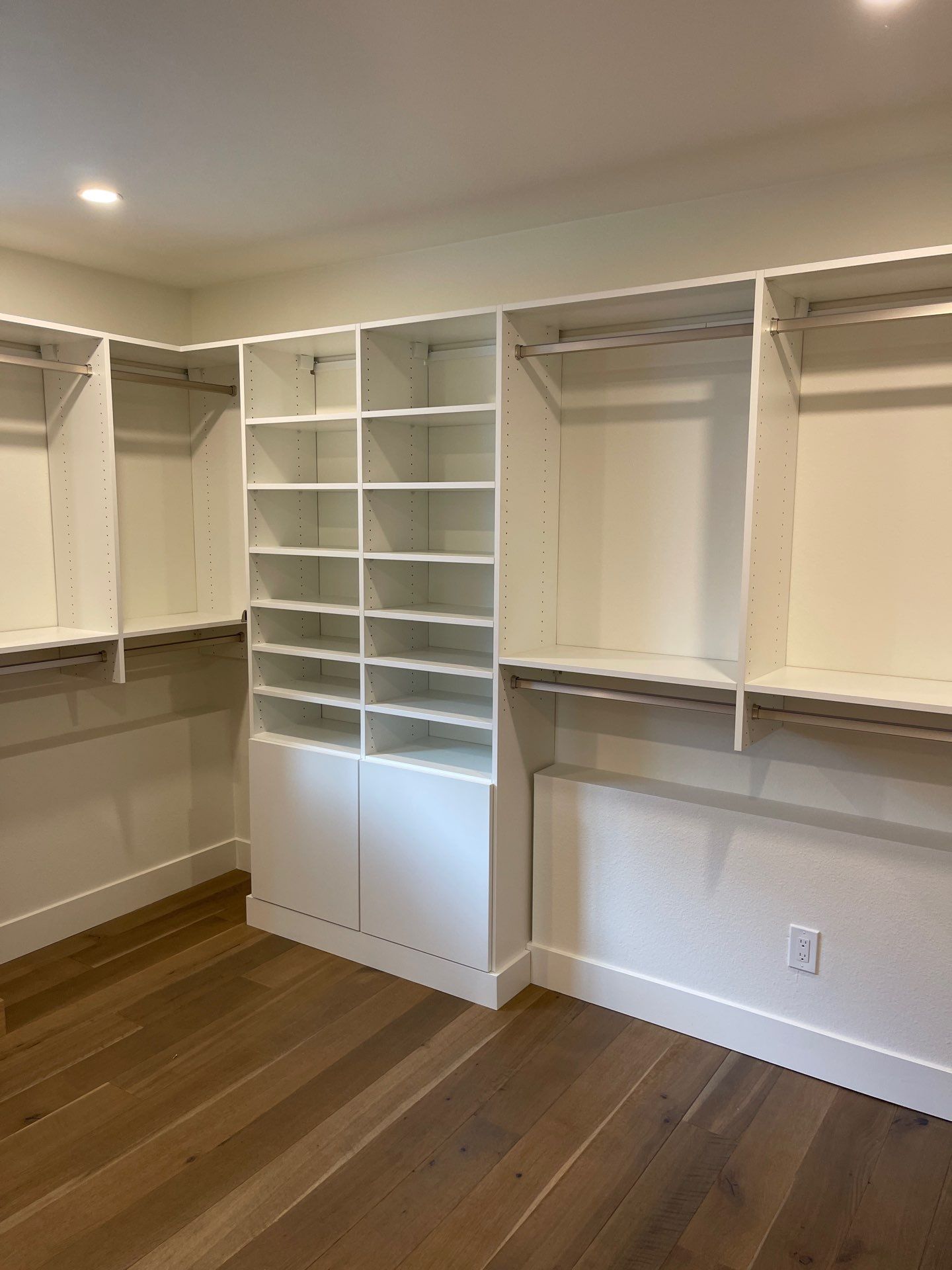 Two-Tone Walk-In Closet in Boulder by Concept 32, Inc.