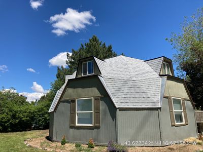 Geometric Dome Home Residential Roofing Installation using Owens Corning