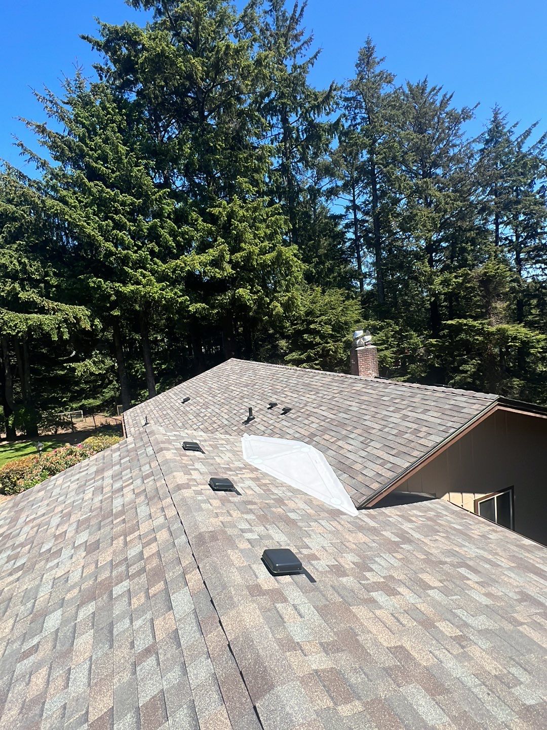 Residential Roofing Installation using Malarkey Highlander with GAF 60mil TPO by Orezona Building & Roofing Company, Inc.