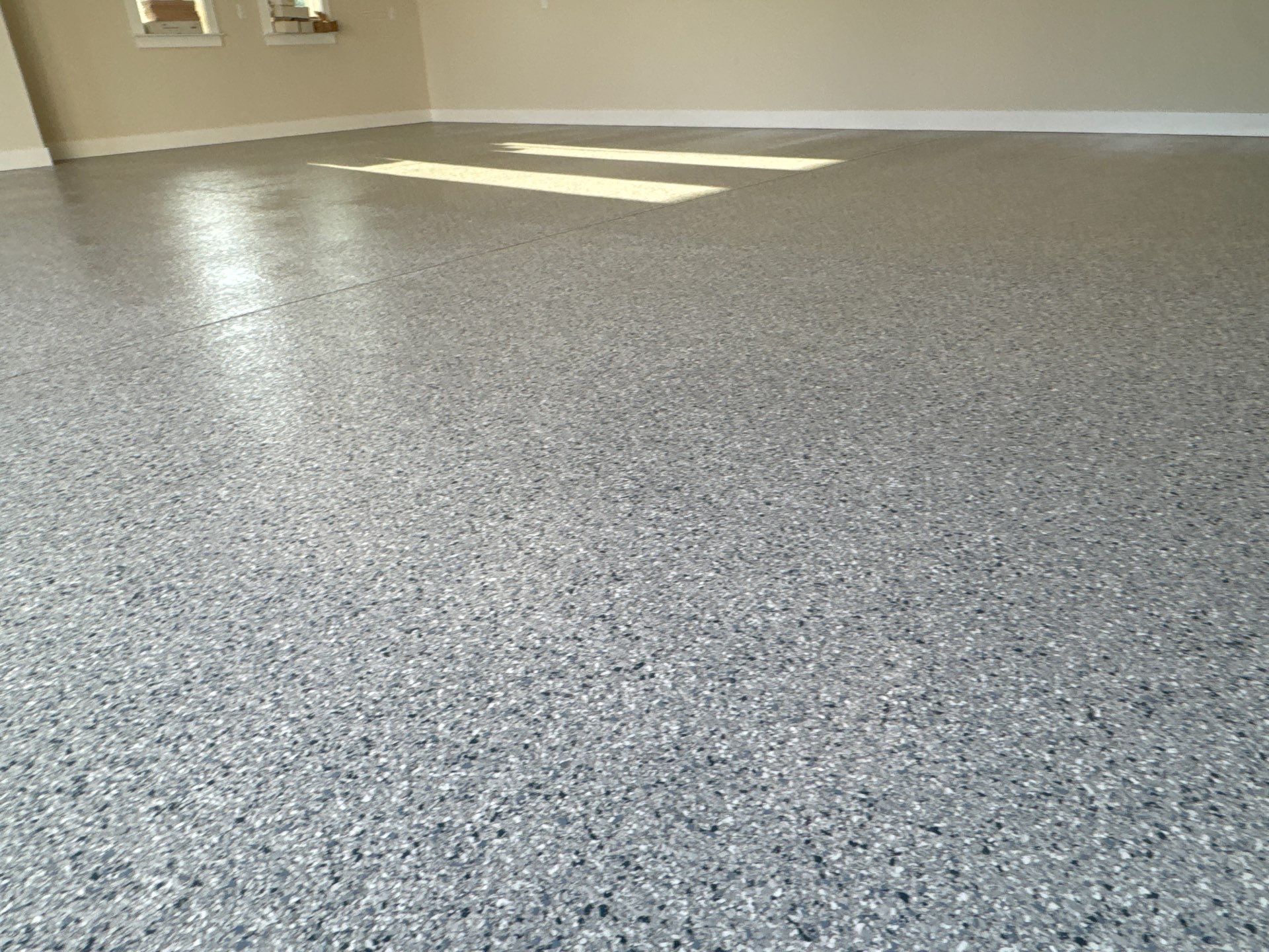 Garage in Tidal Wave by Cross Creek Concrete Coatings